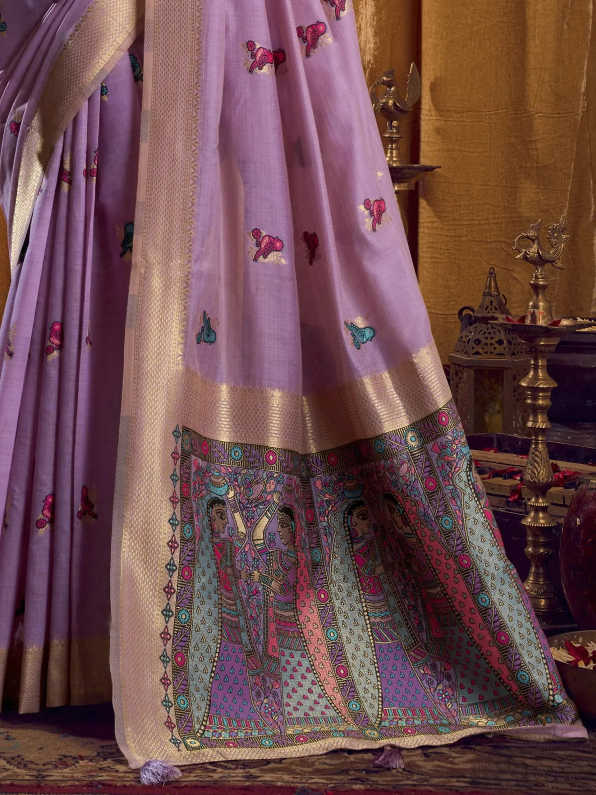 Tarani lavender khadi cotton saree pallu view with detailed embroidered artwork and zari border