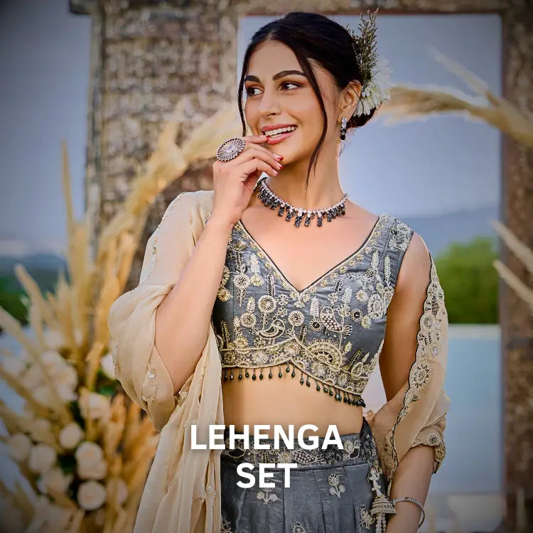 Tarani premium designer lehenga set in grey with intricate embroidery and elegant festive styling for women collection