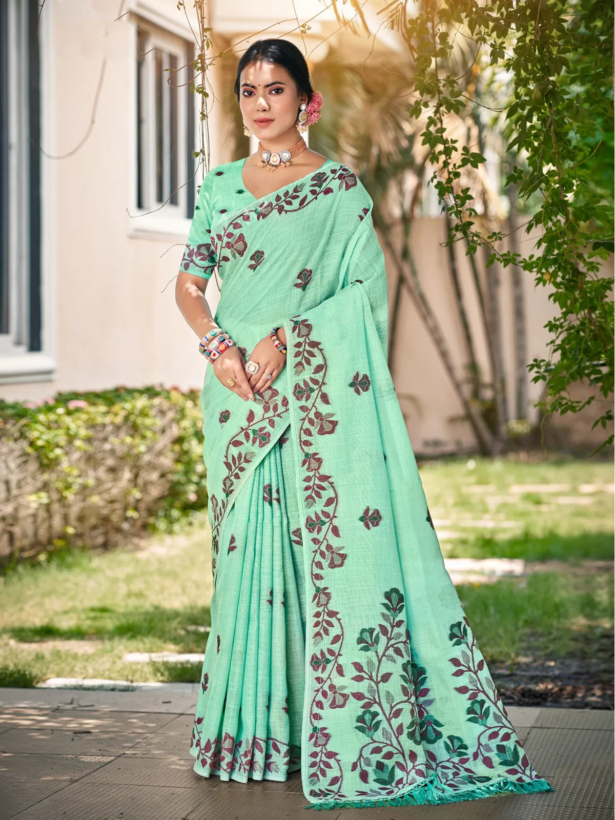 Tarani mint green Lilen festive saree full view with floral embroidery and matching blouse