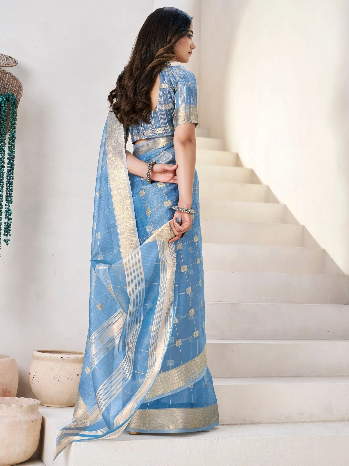 Tarani Mokshita blue linen cotton silk saree with zari work back view