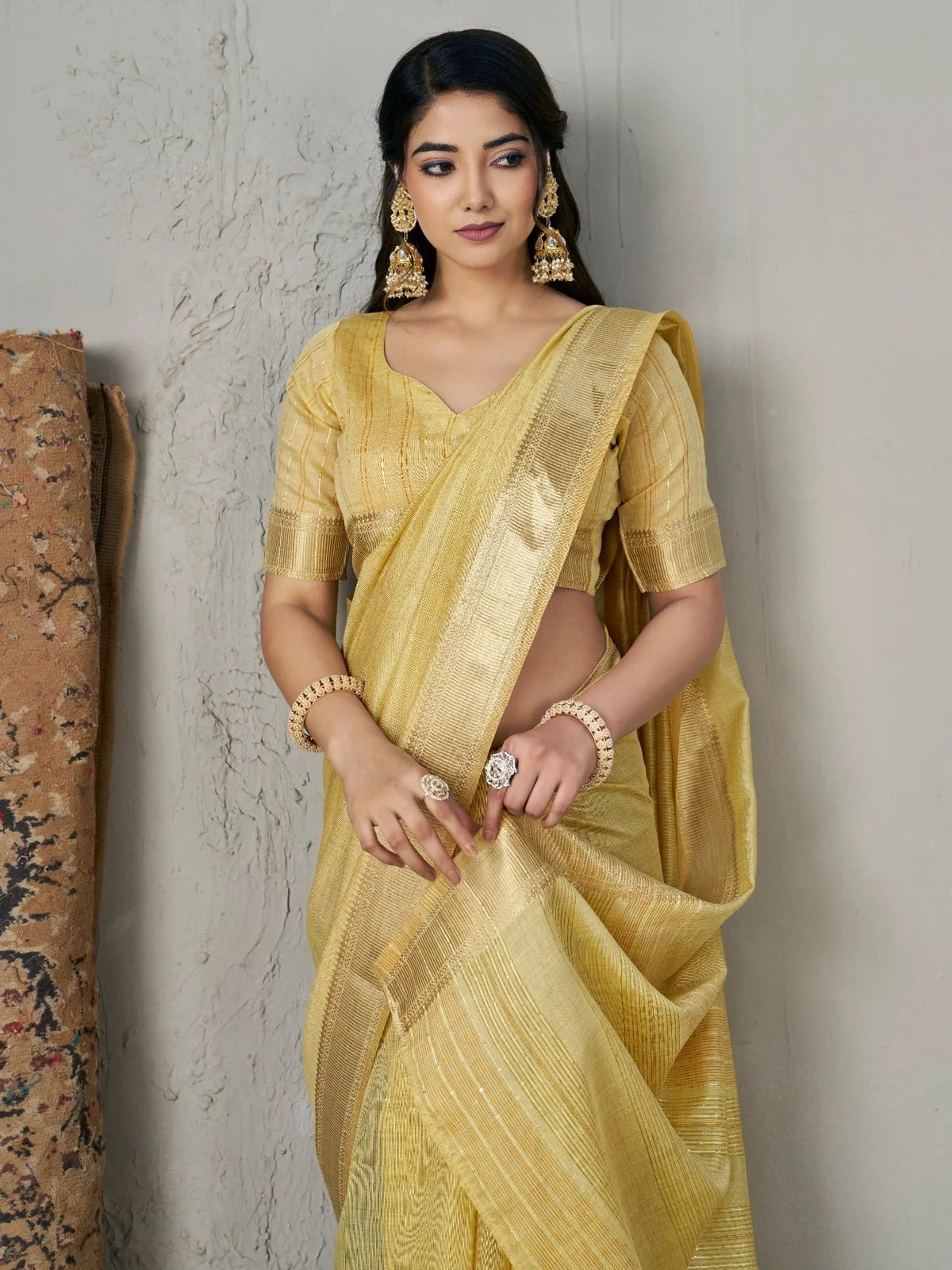 Tarani golden soft linan cotton silk saree pallu view showcasing zari border detailing