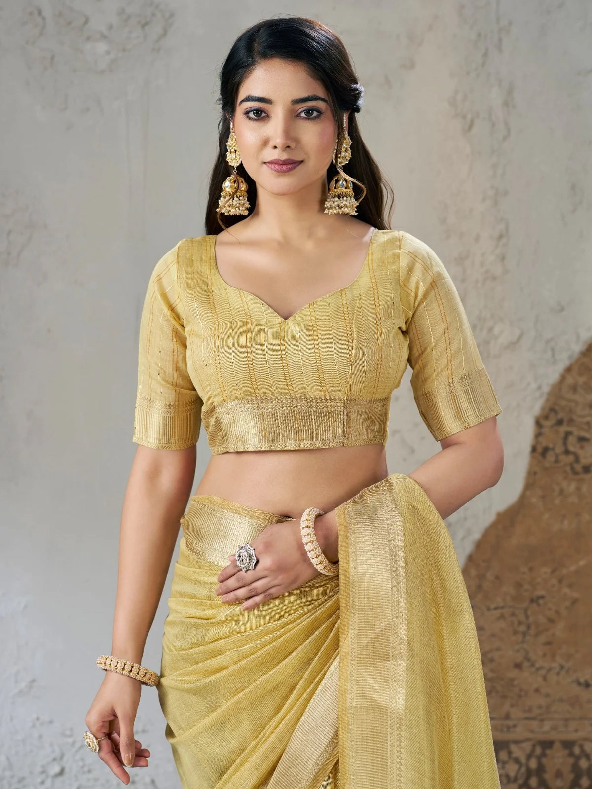 Tarani golden soft linan cotton silk saree upper body view highlighting blouse and zari texture