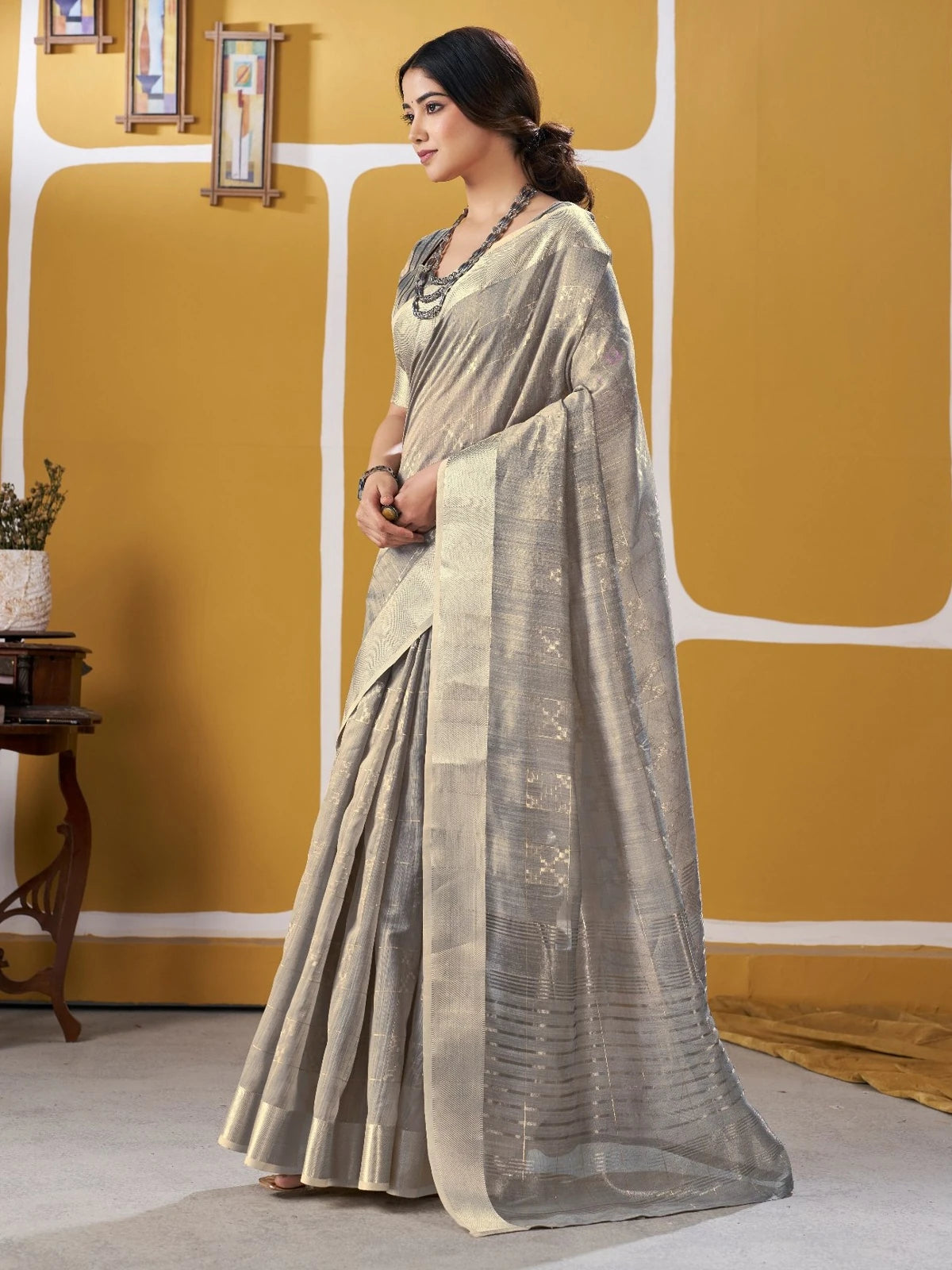 Tarani grey linen cotton silk saree elegant side profile with zari border
