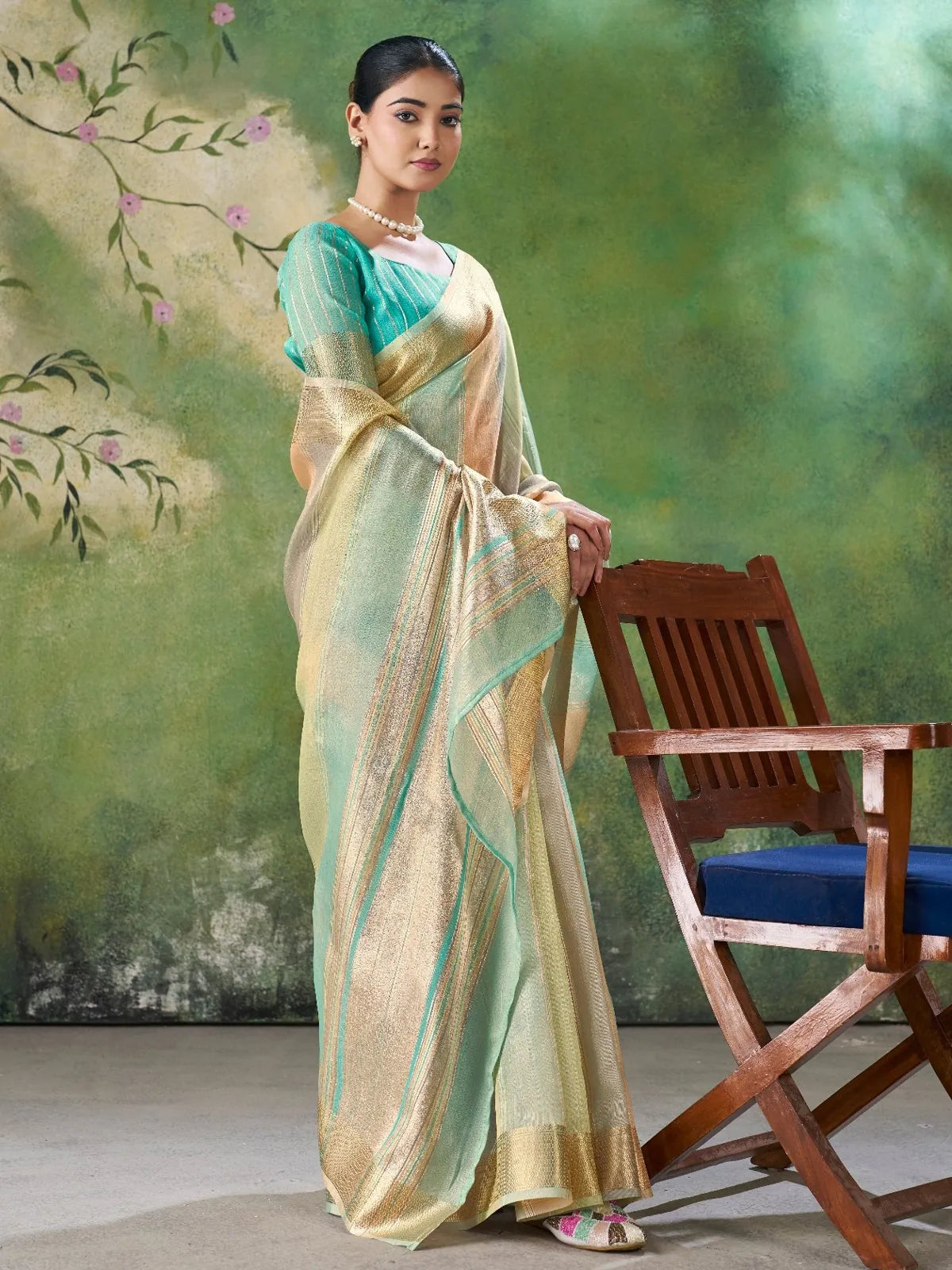 Tarani Alpana mint green soft linan cotton silk saree front pose party wear look