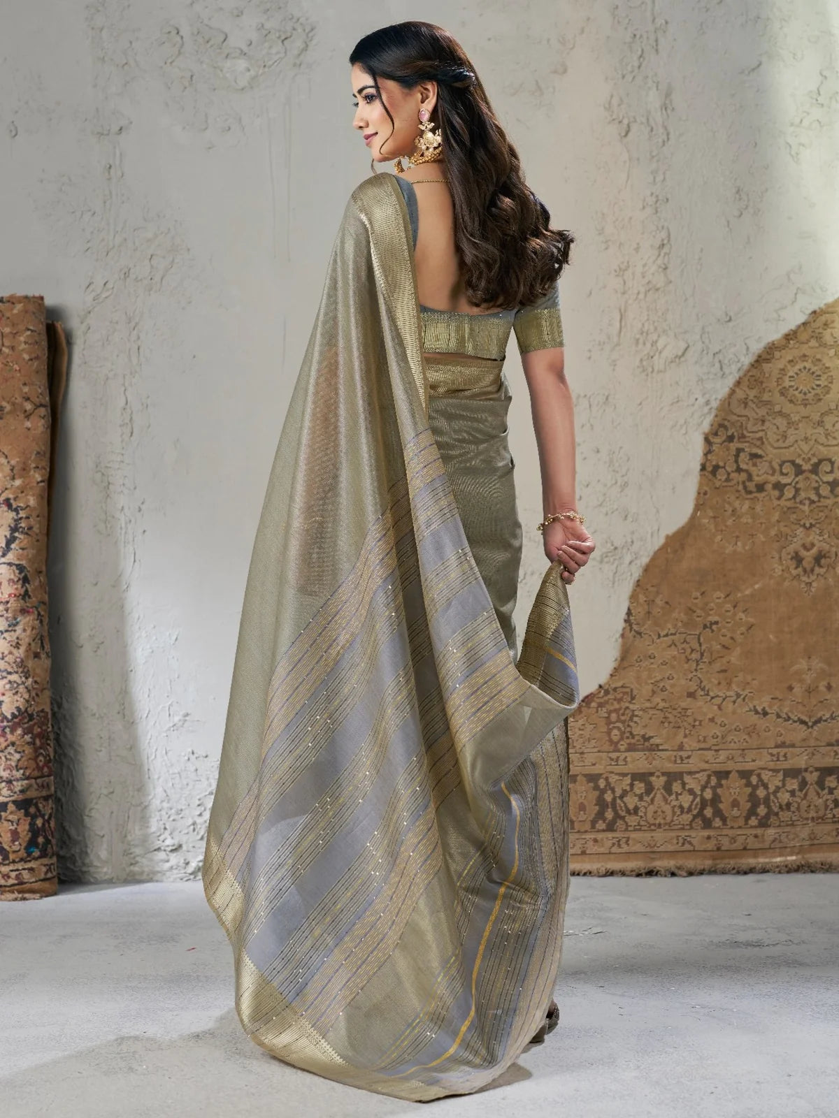Tarani Neelashri olive green linen cotton silk saree elegant back view with pallu