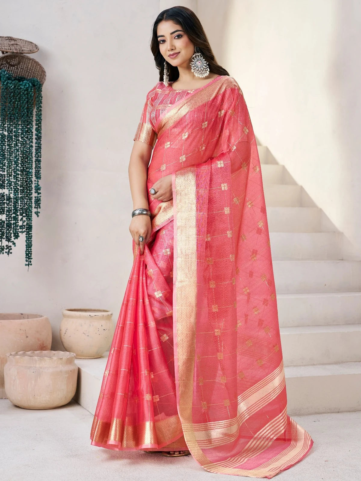 Tarani pink zari work saree front view with elegant woven border