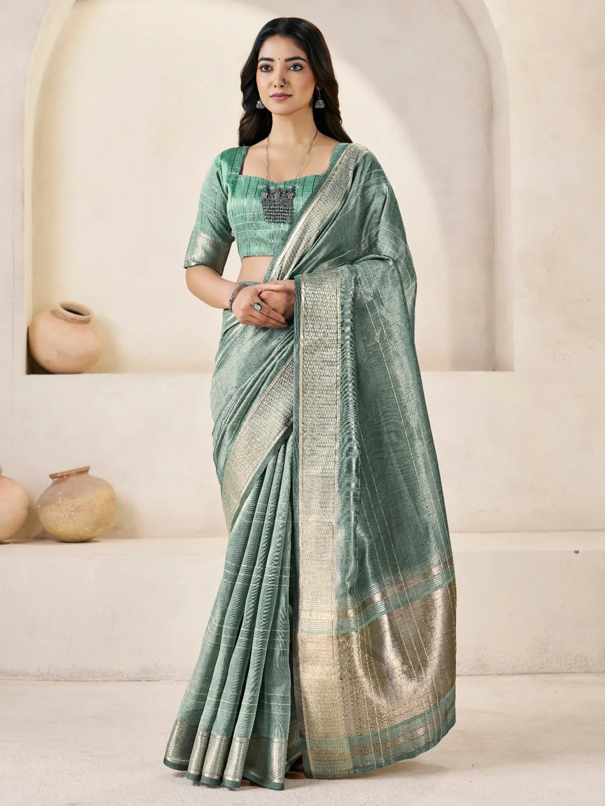 Tarani sea green linen cotton silk saree with zari work full front view for wedding and party wear