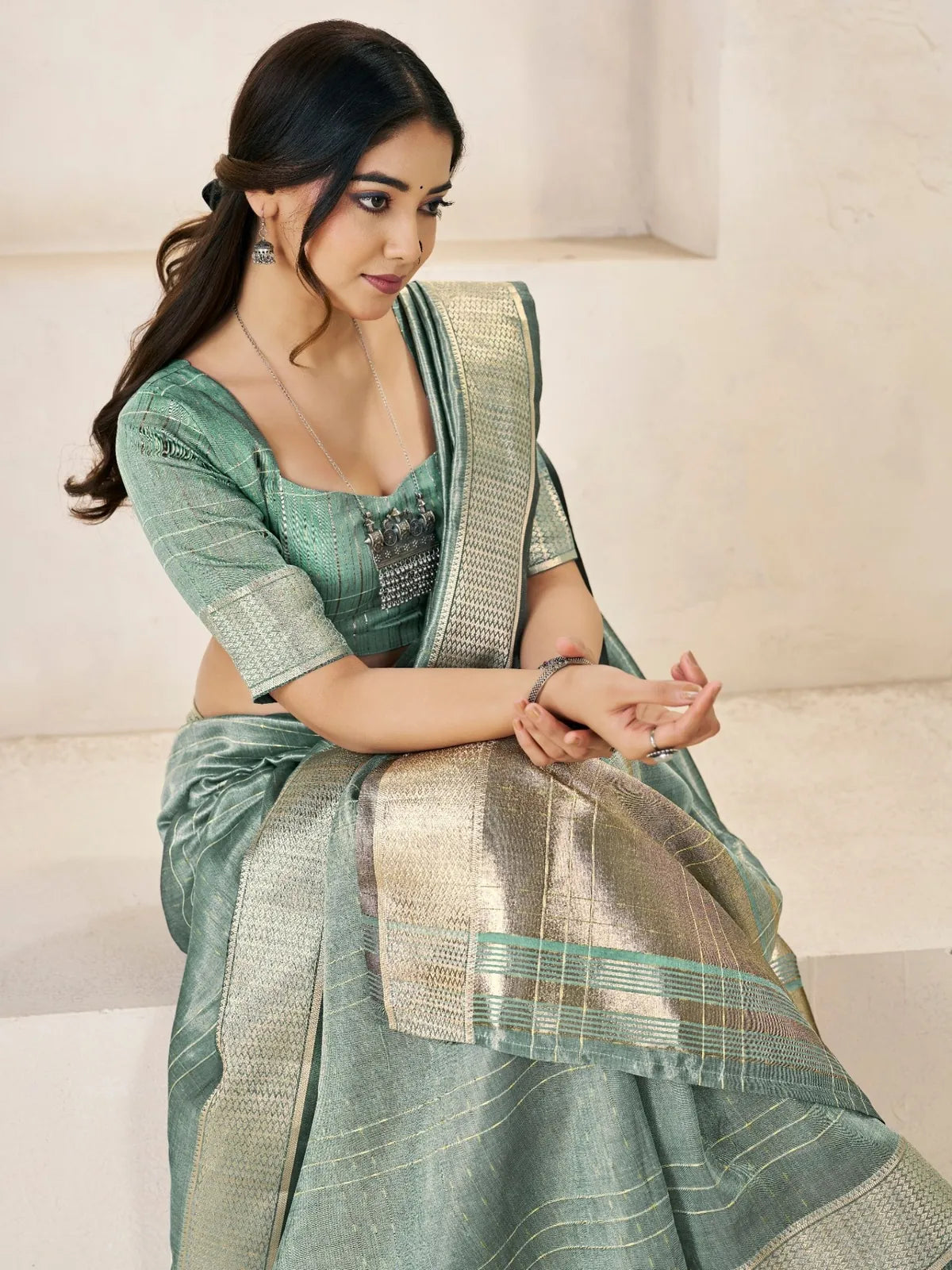 Tarani sea green linen cotton silk saree close pallu view with rich zari woven border design