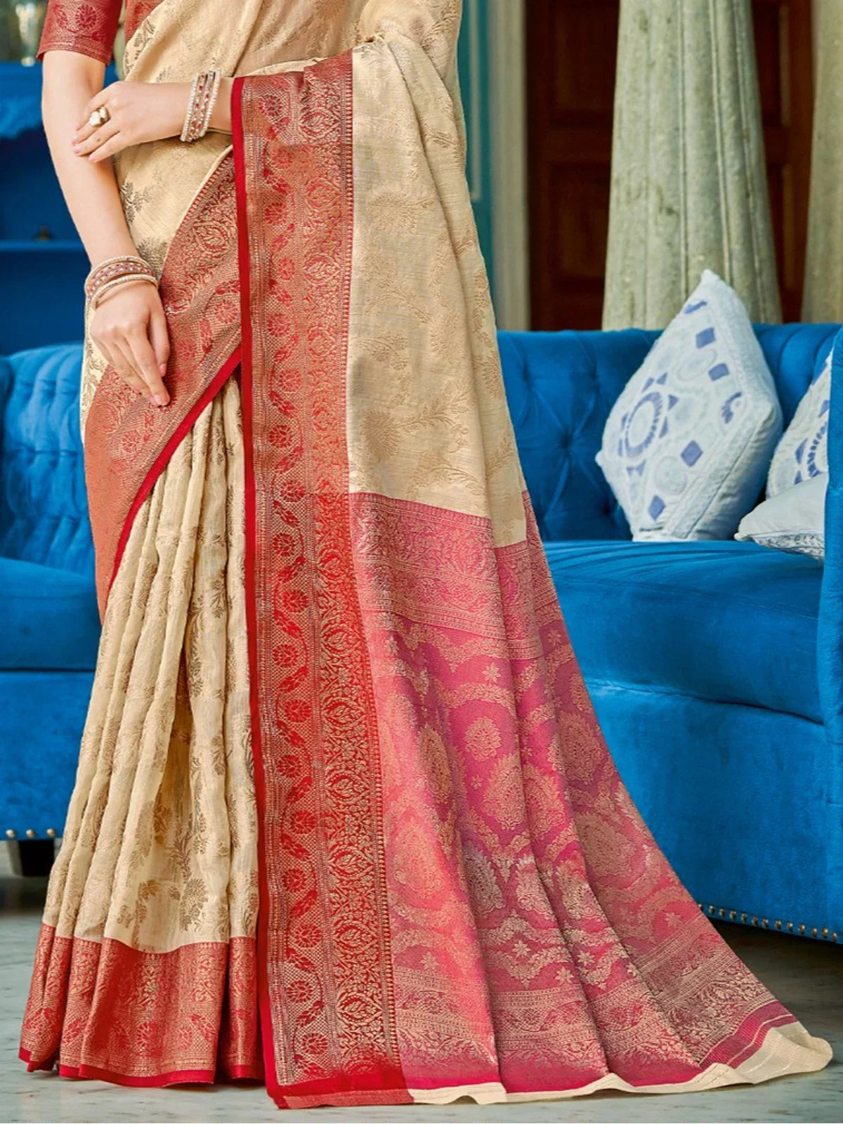 Tarani premium linen cotton saree pallu close view with traditional red woven border by Tarani