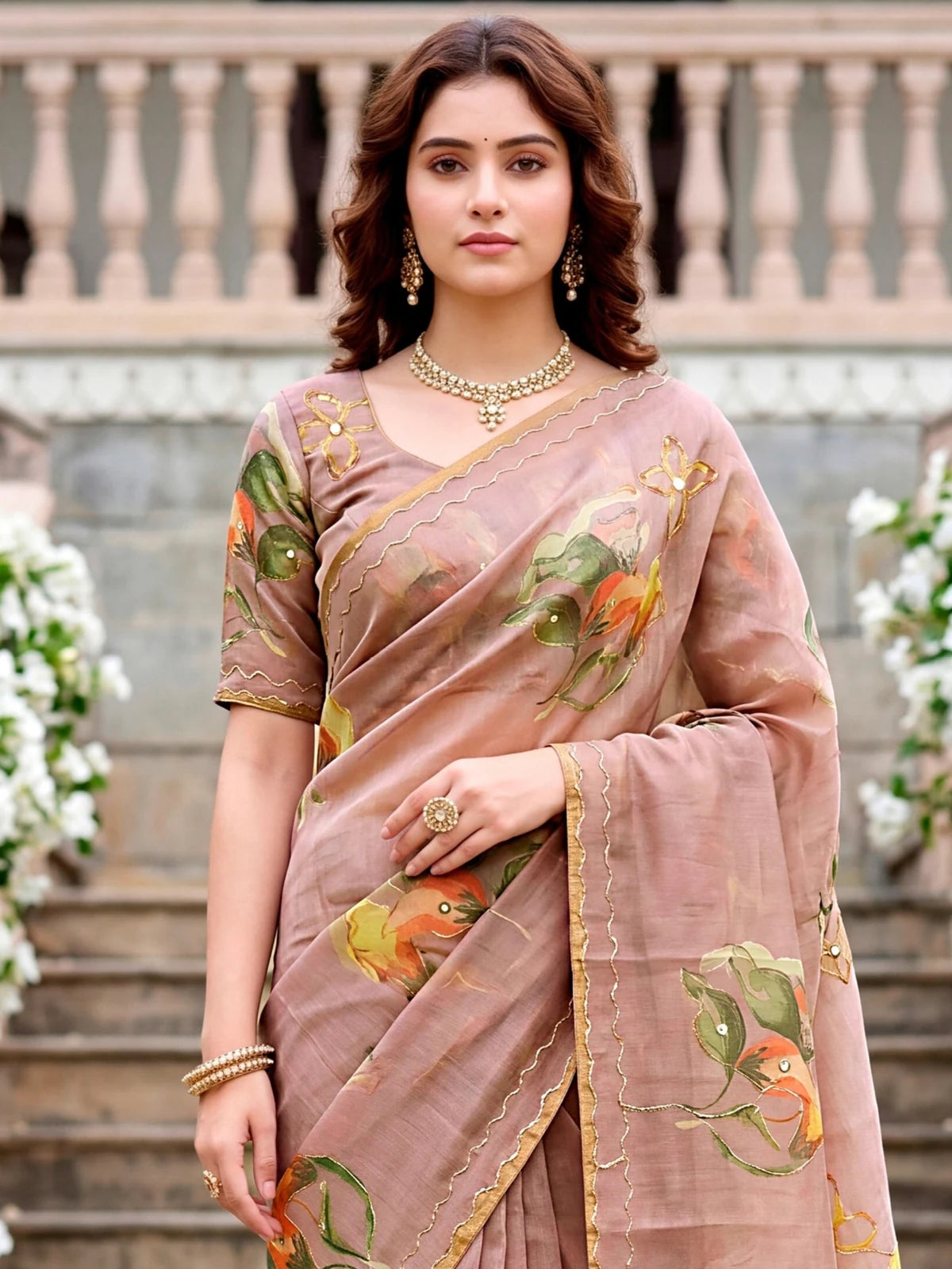 Tarani dusty pink linen cotton saree upper body view with floral Aari work