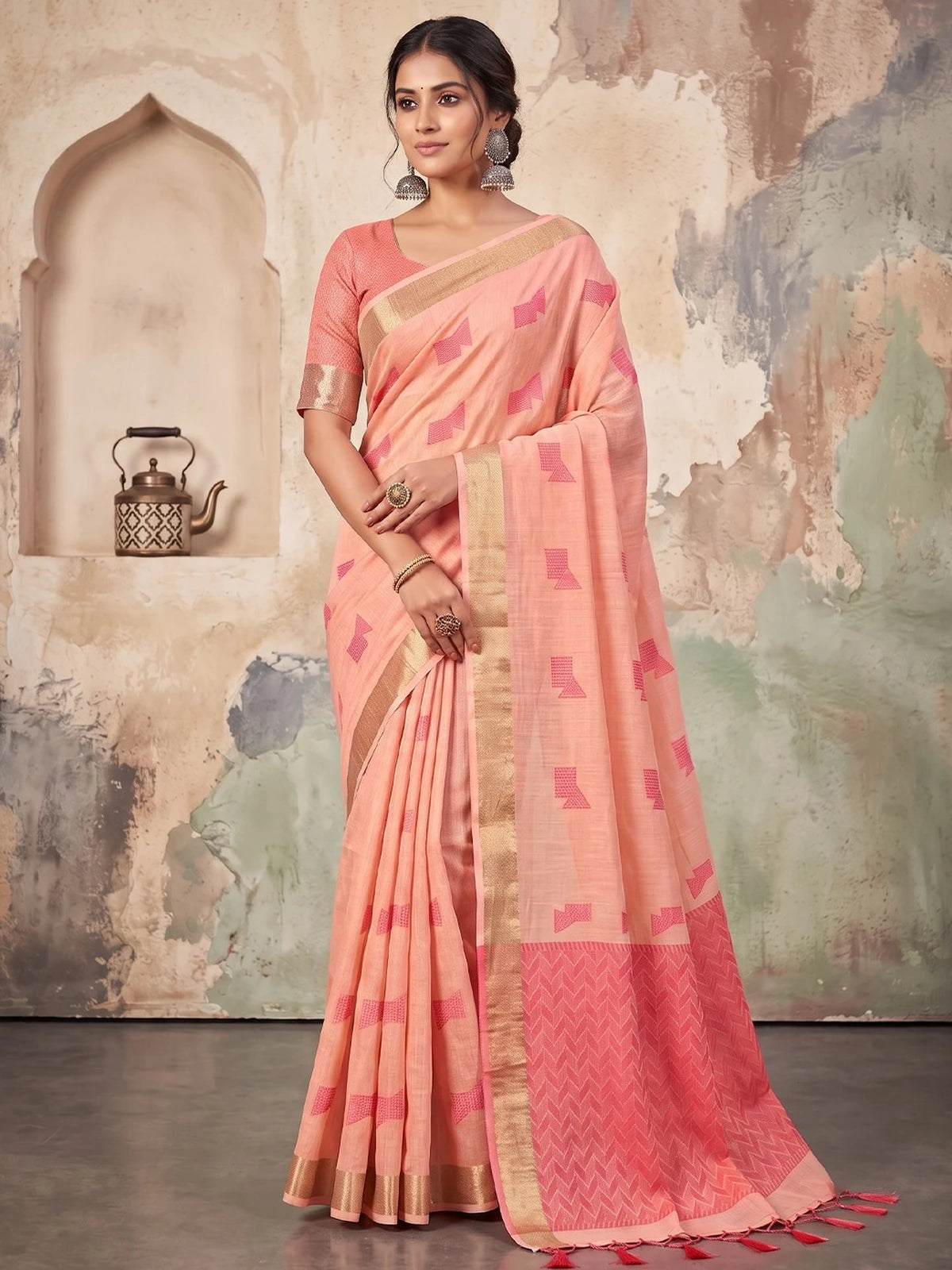 Tarani peach linen cotton saree full view with geometric woven work and tassel