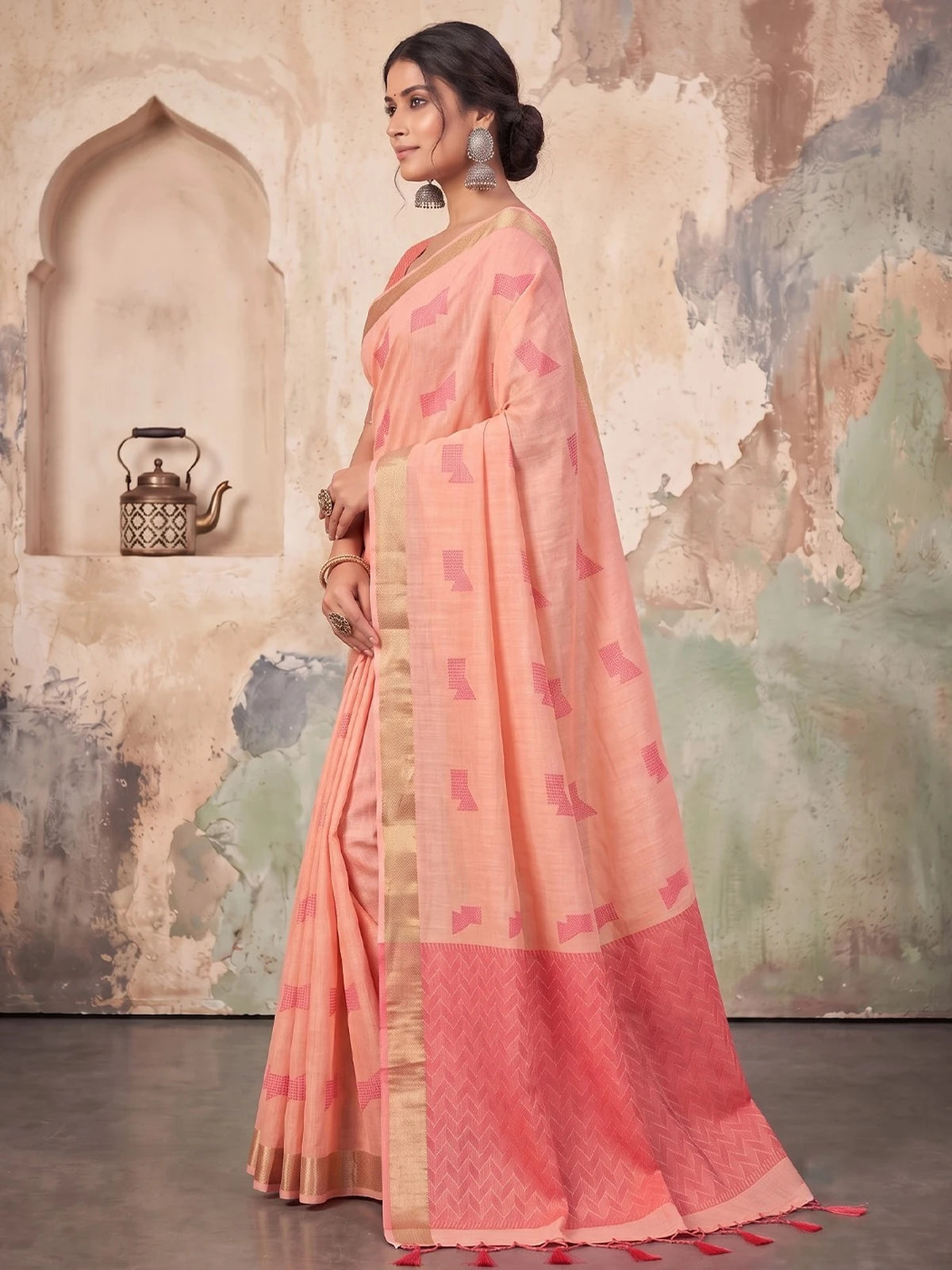 Tarani peach linen cotton saree side view with elegant woven design