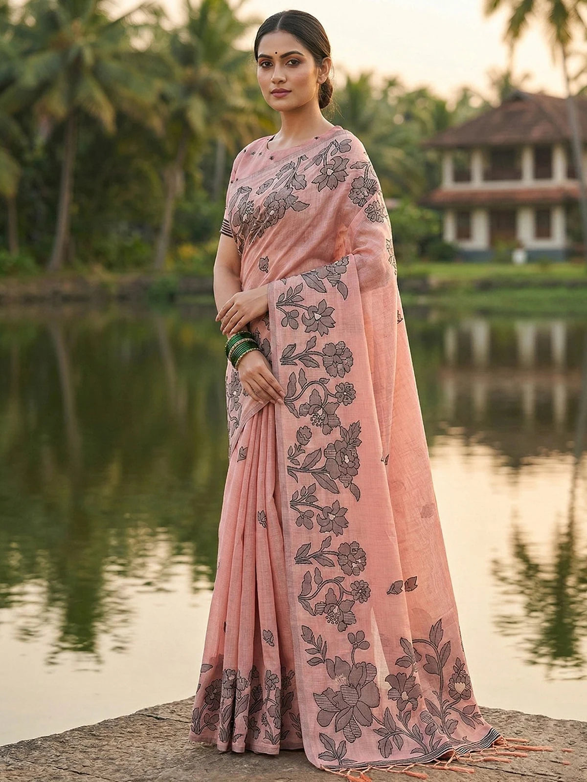 Tarani peach linen cotton printed saree side view showcasing floral pallu and elegant drape