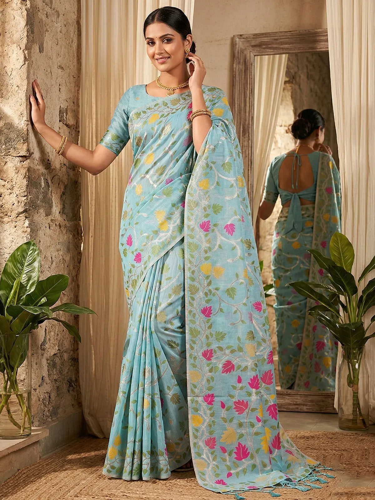 Tarani Sunanda sky blue linen cotton saree elegant front pose with floral pallu