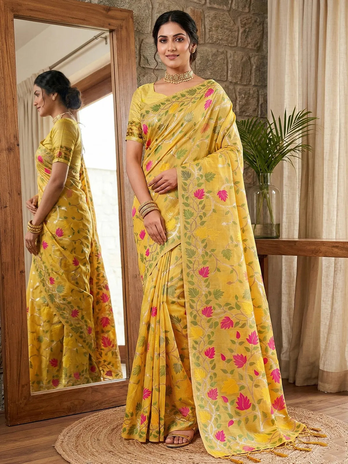 Tarani yellow linen cotton saree front view with floral woven design and tassel pallu Sadhana