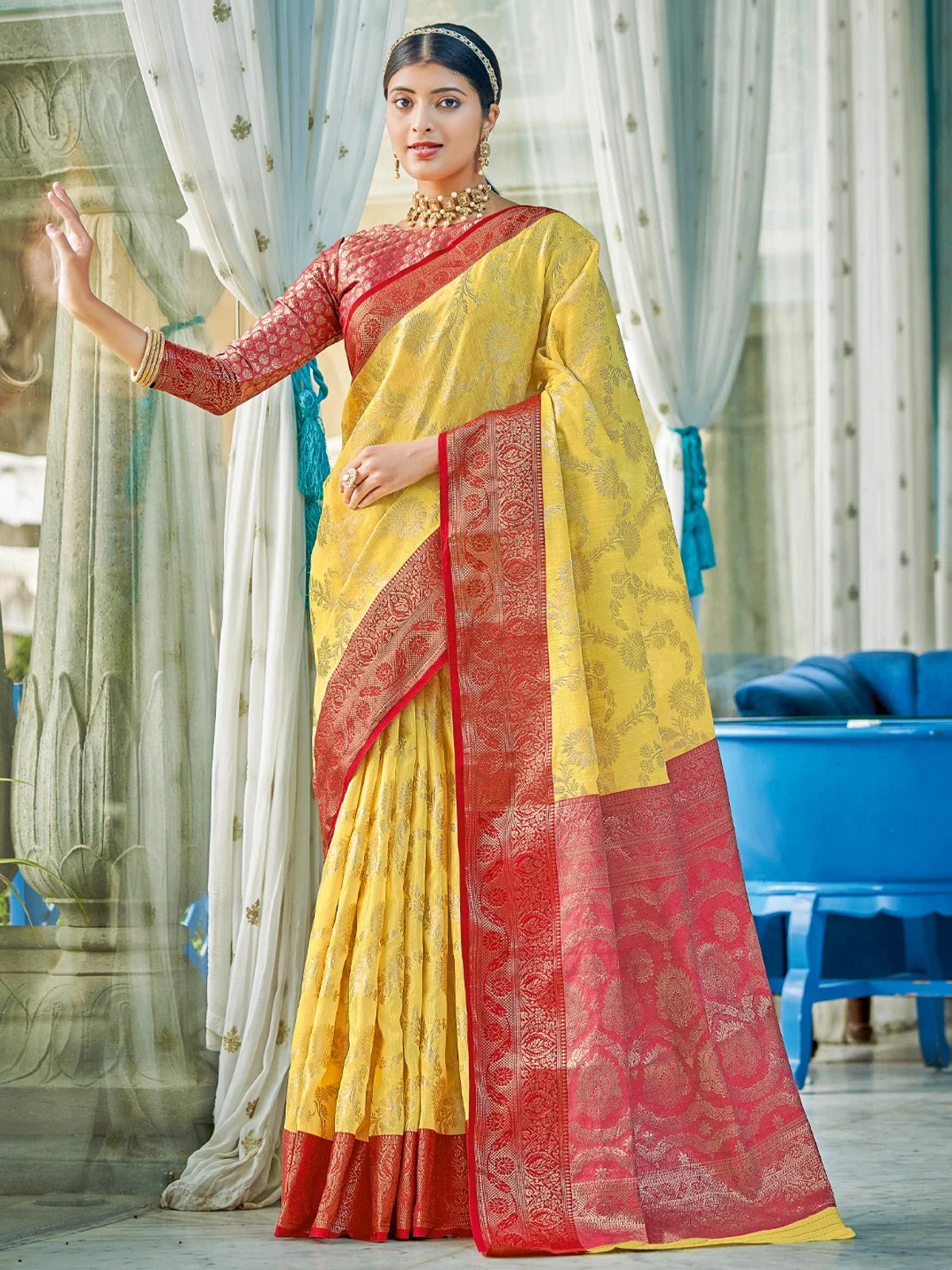 Tarani premium yellow linen cotton saree with red contrast border and pallu for festive wear