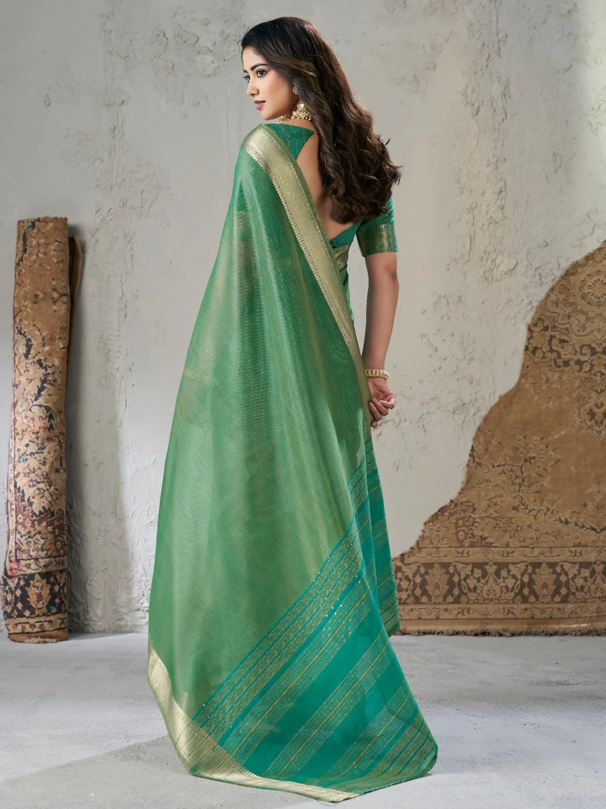 Tarani green linen cotton silk saree back view highlighting pallu fall and design