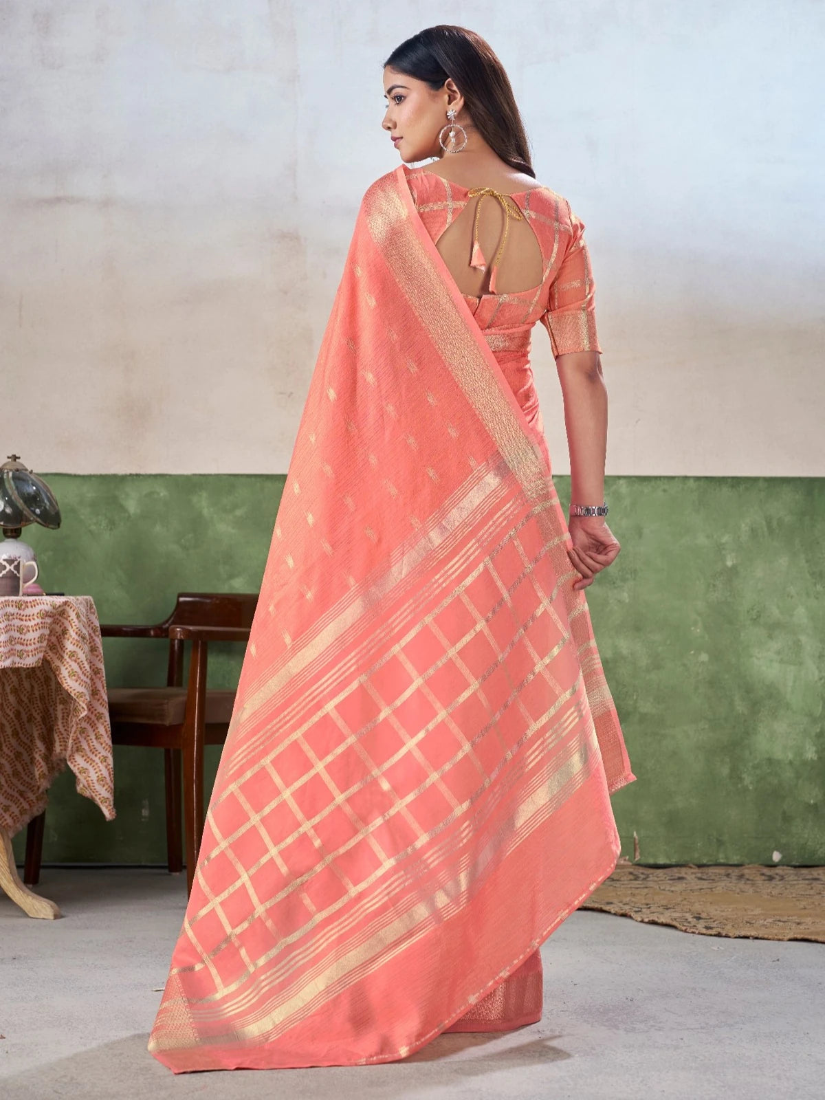 Tarani peach wedding wear saree back view highlighting blouse and pallu