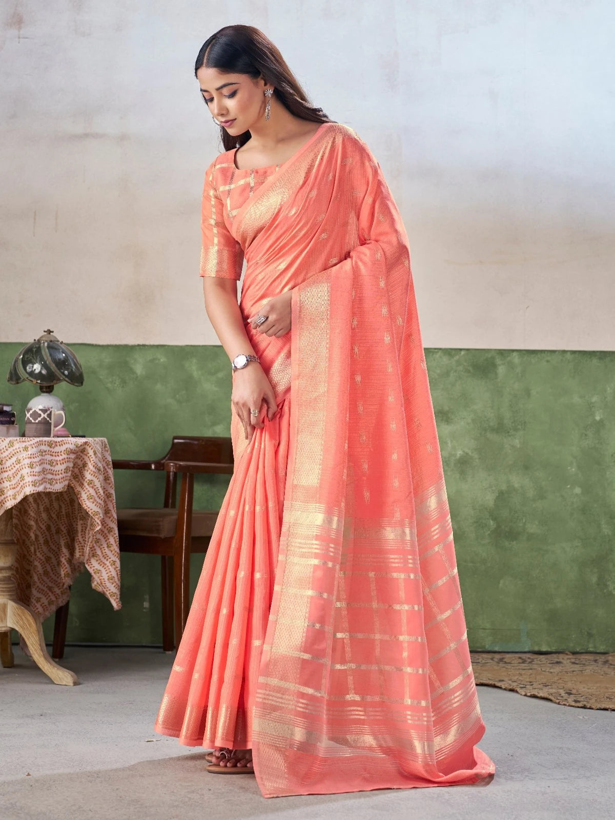 Tarani soft linen cotton silk saree elegant front pose with golden zari border
