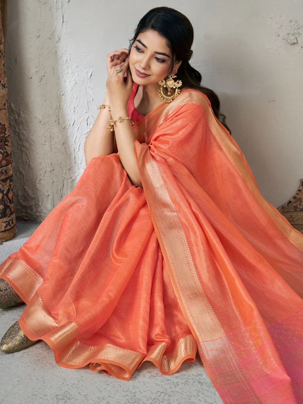 Tarani Mihika peach linen cotton silk saree pallu and border showcase with zari work