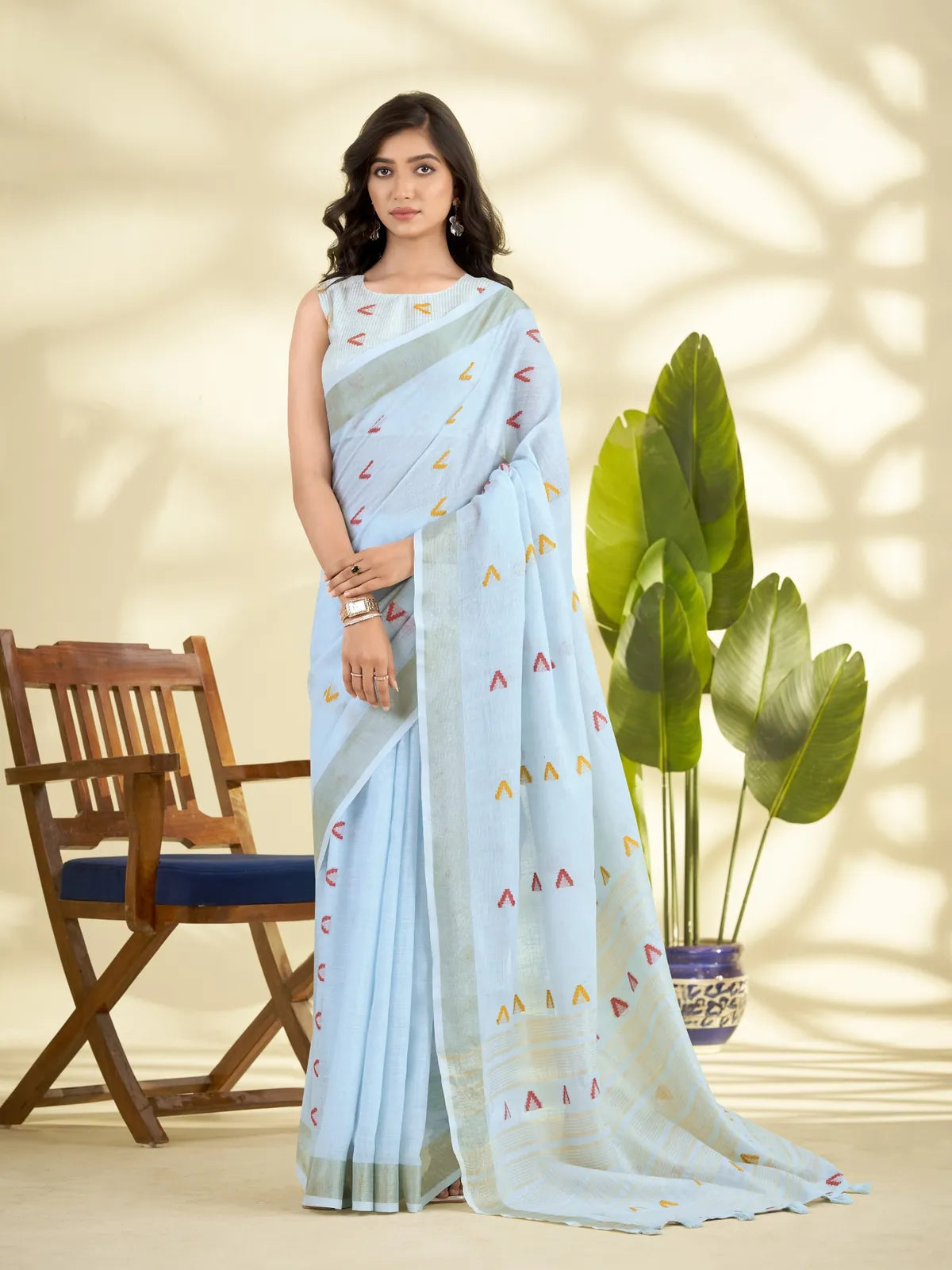 Tarani light blue linen silk saree full view with zari border and multicolor motifs for daily elegance