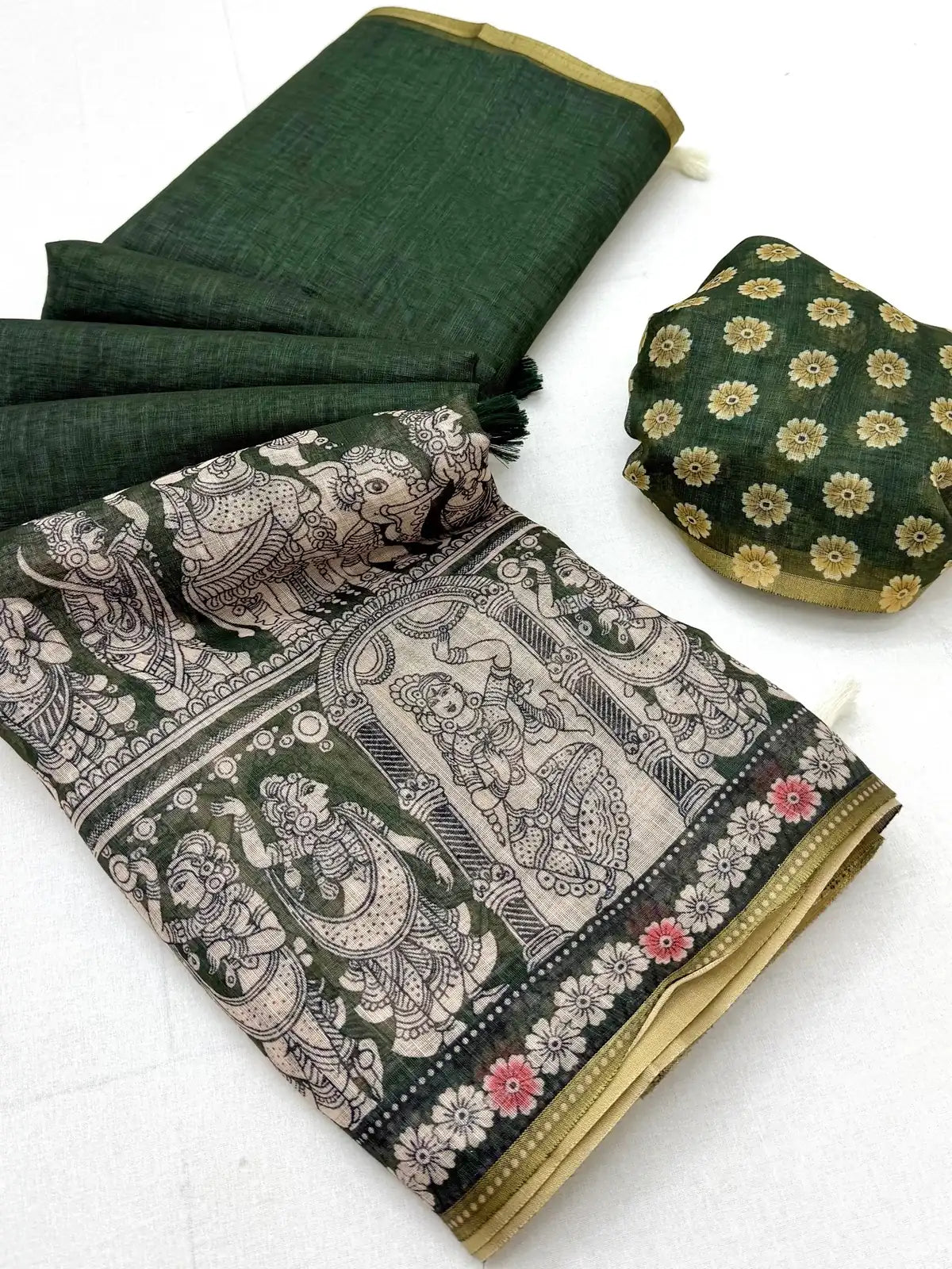Tarani soft cotton blouse piece with matching dark green linen saree