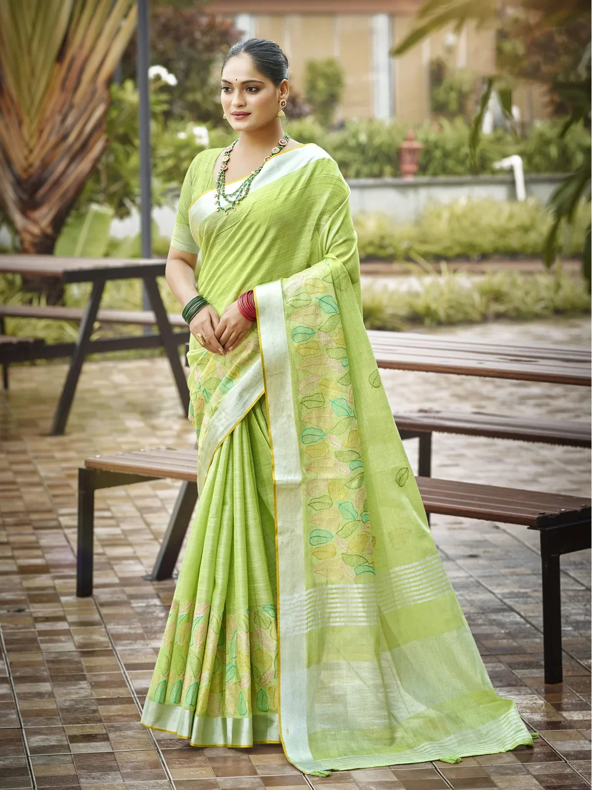Tarani elegant green linen saree full view with blouse piece