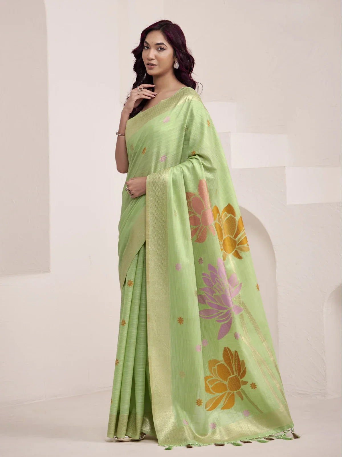 Tarani premium green linen saree full view with jacquard lotus design and butti work