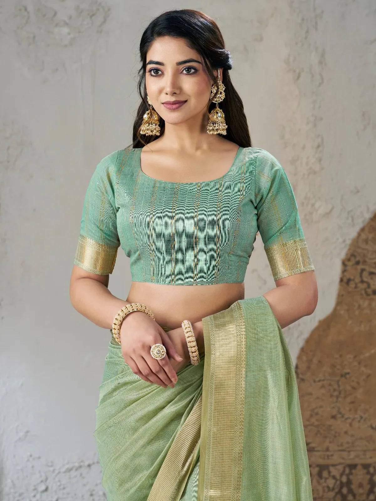 Tarani Parinita green linen cotton silk saree upper body blouse and zari border detail