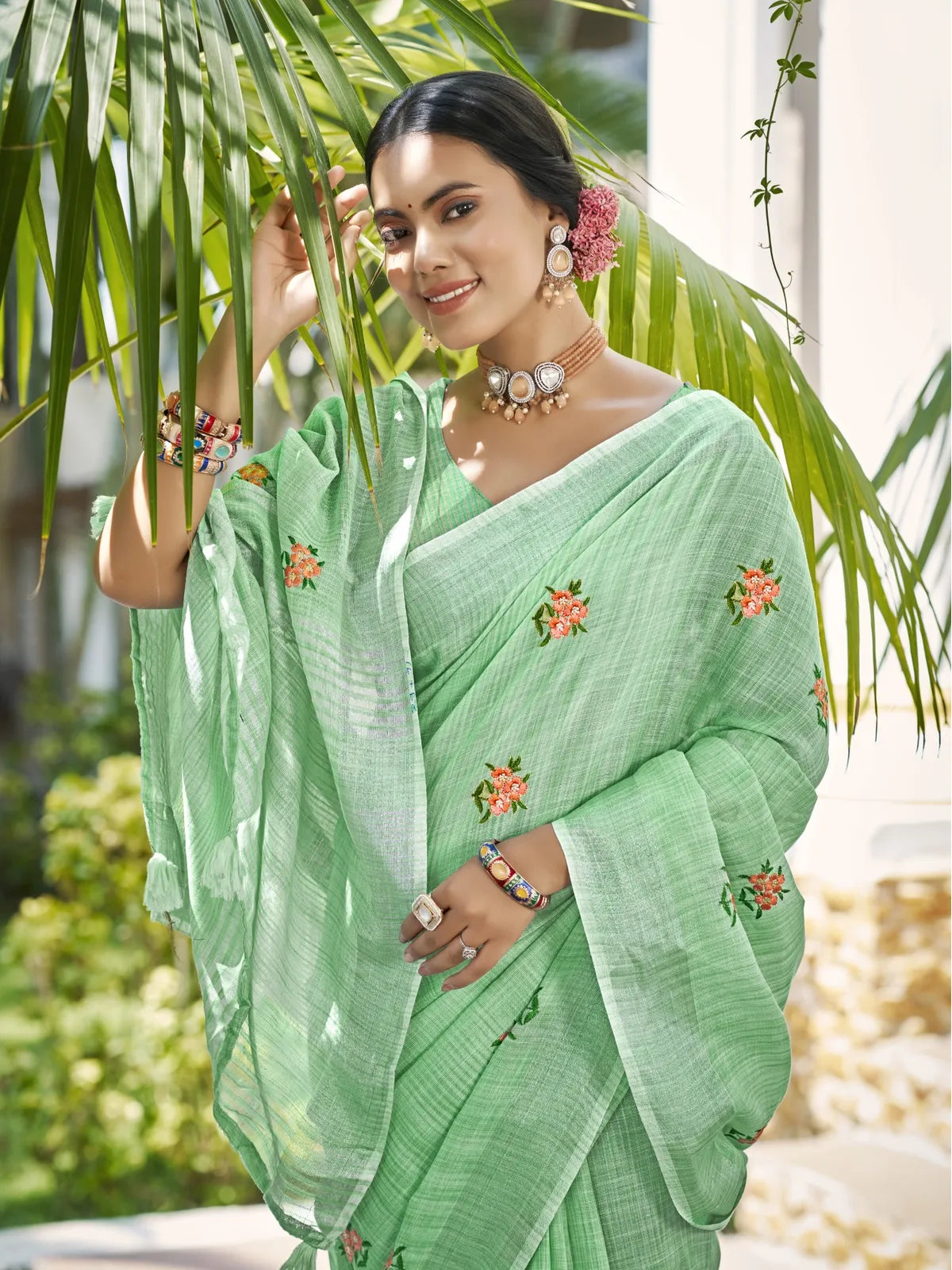 Tarani green linen saree upper body view showing blouse and embroidery details