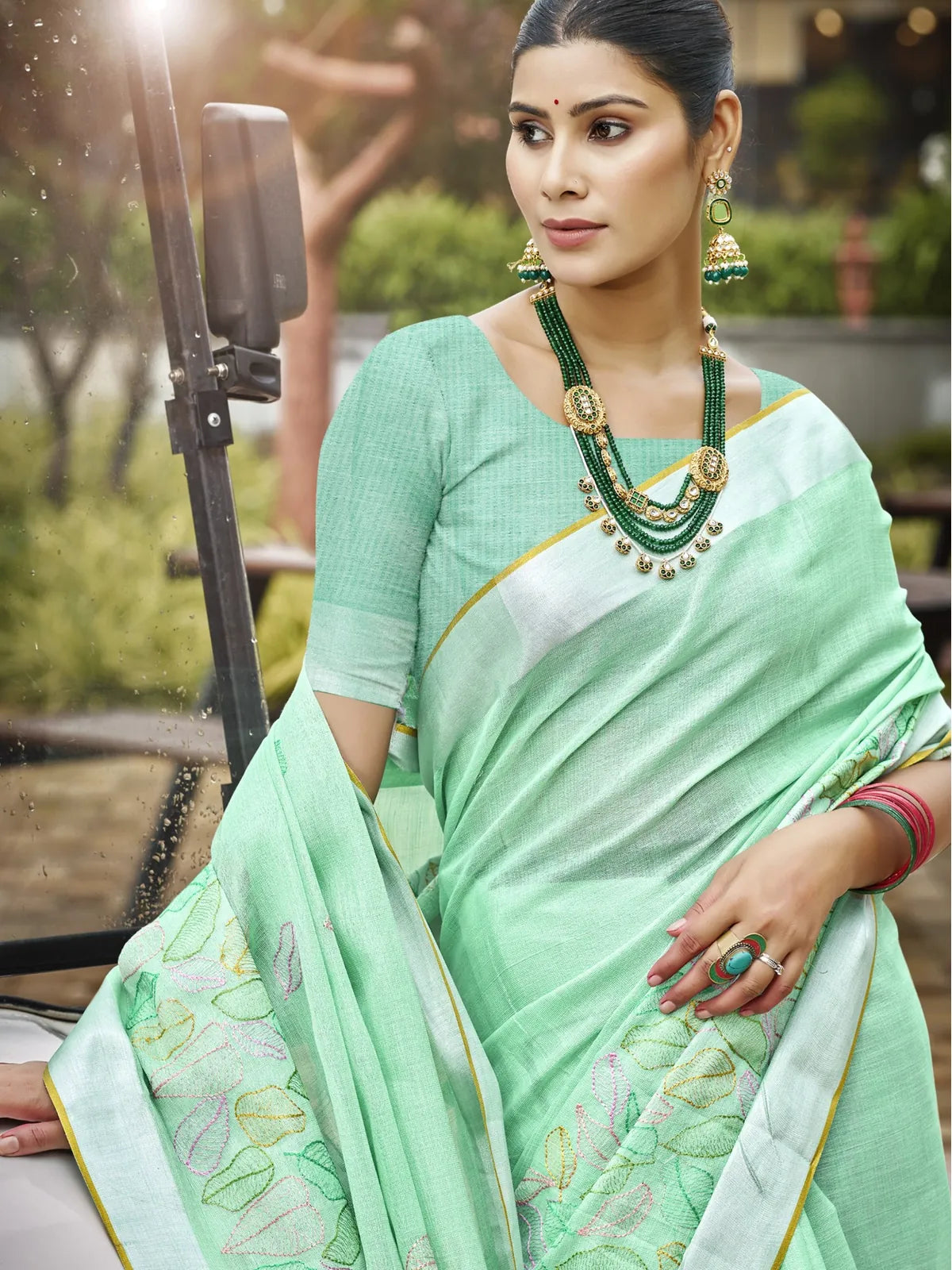 Tarani green linen saree with blouse close upper body view
