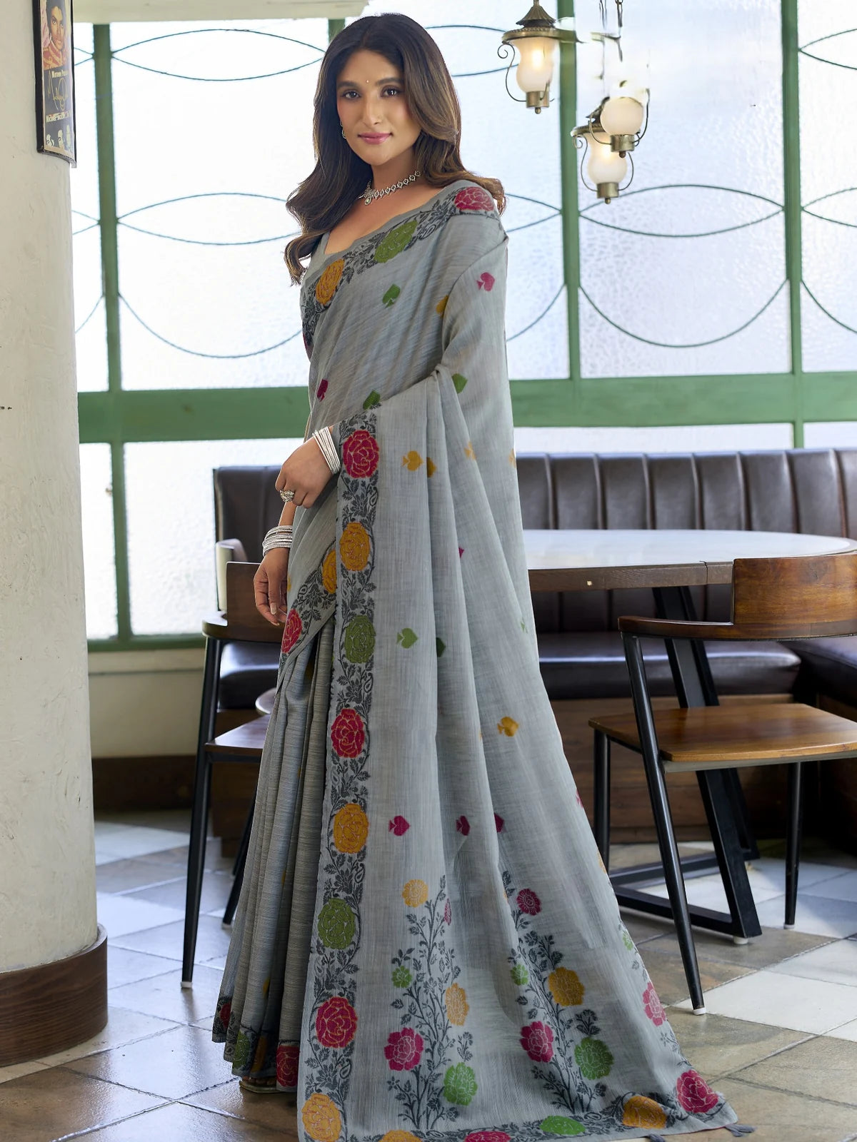 Tarani elegant grey floral woven linen saree side pose with handloom festive drape styling