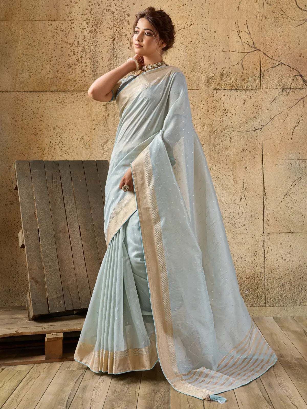 Tarani light blue Tissue Linen saree side showing zari detailing