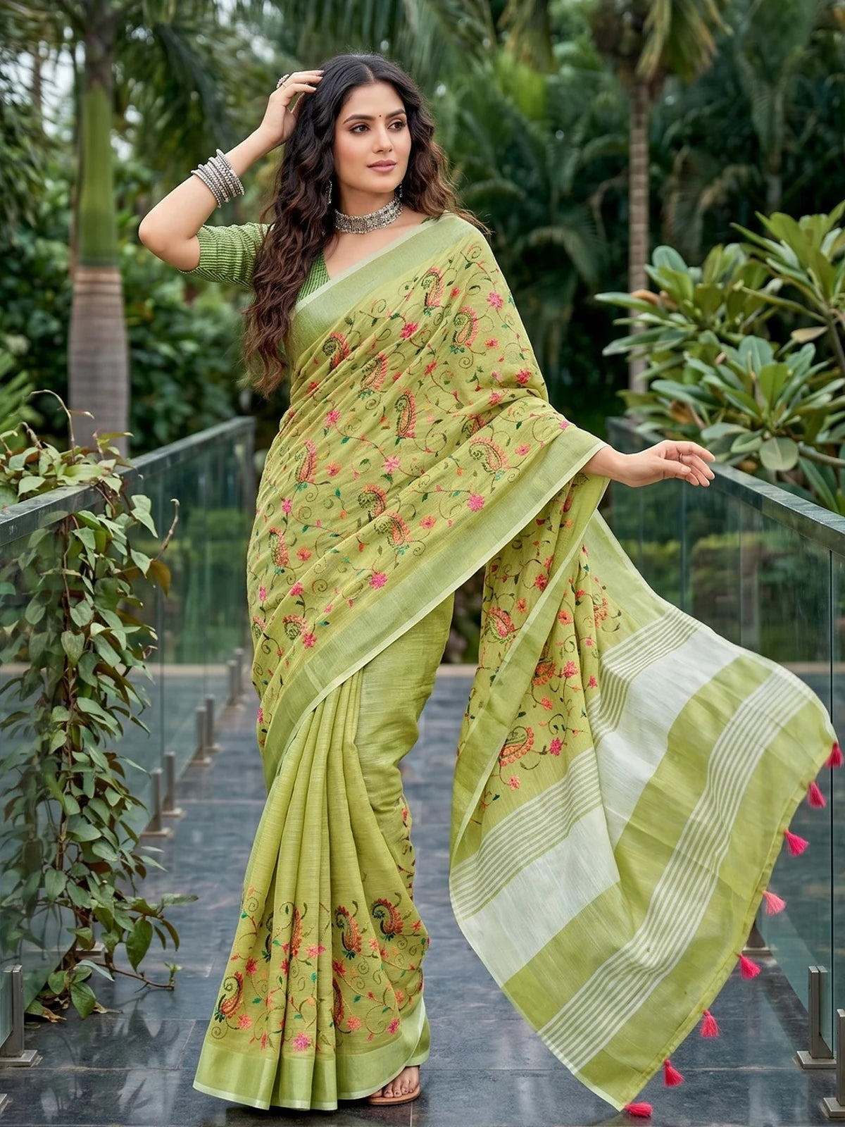 Tarani Hansika light green linen saree front view with embroidered pallu and blouse