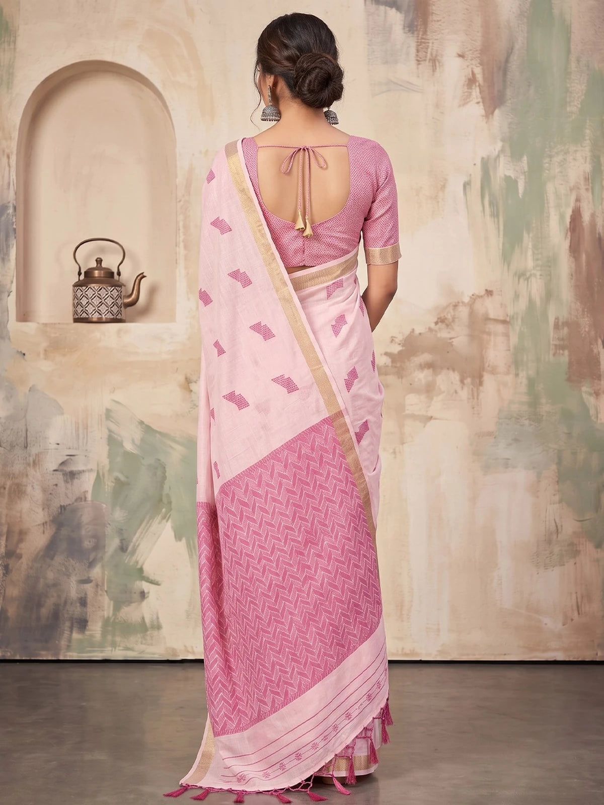 Tarani light pink linen cotton saree back view with elegant woven border