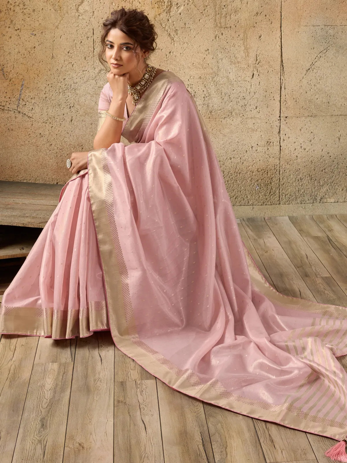 Tarani pink Tissue Linen saree pallu view with rich zari border and graceful woven detailing