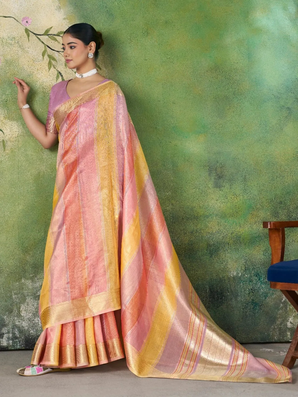 Tarani pink soft linen cotton silk saree side pose highlighting drape and rich zari work