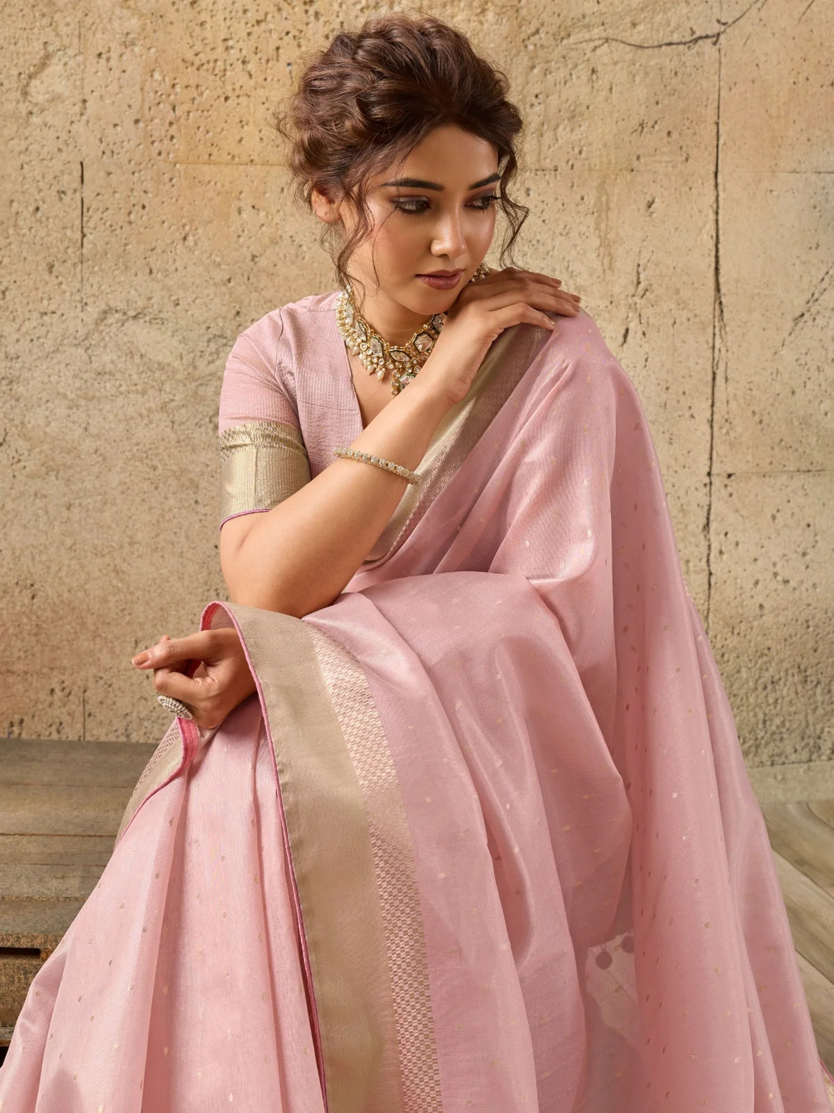 Tarani pink Tissue Linen saree upper body view highlighting zari border and Linen Woven blouse