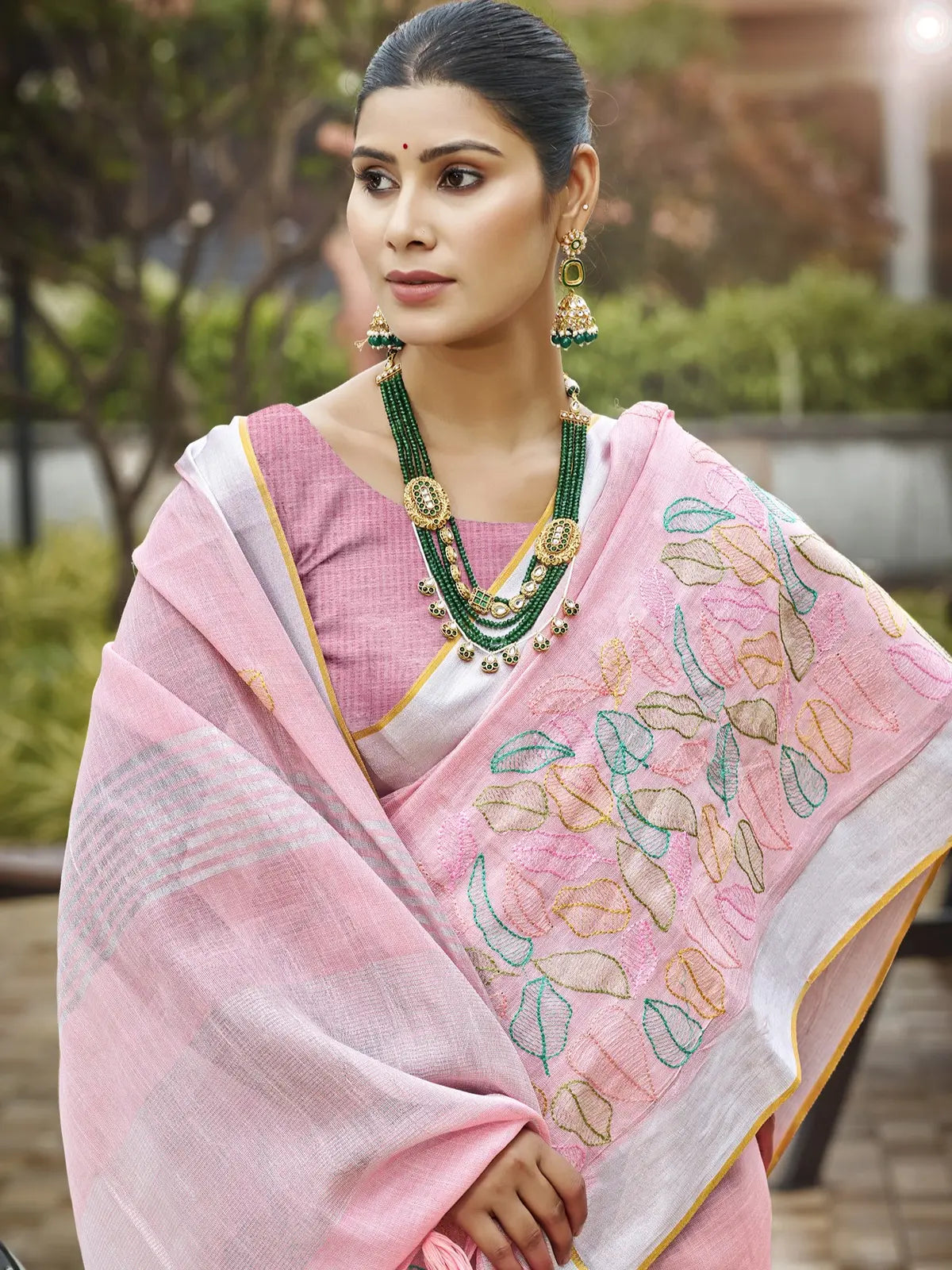 Tarani pink linen saree upper body view styled with jewelry and blouse
