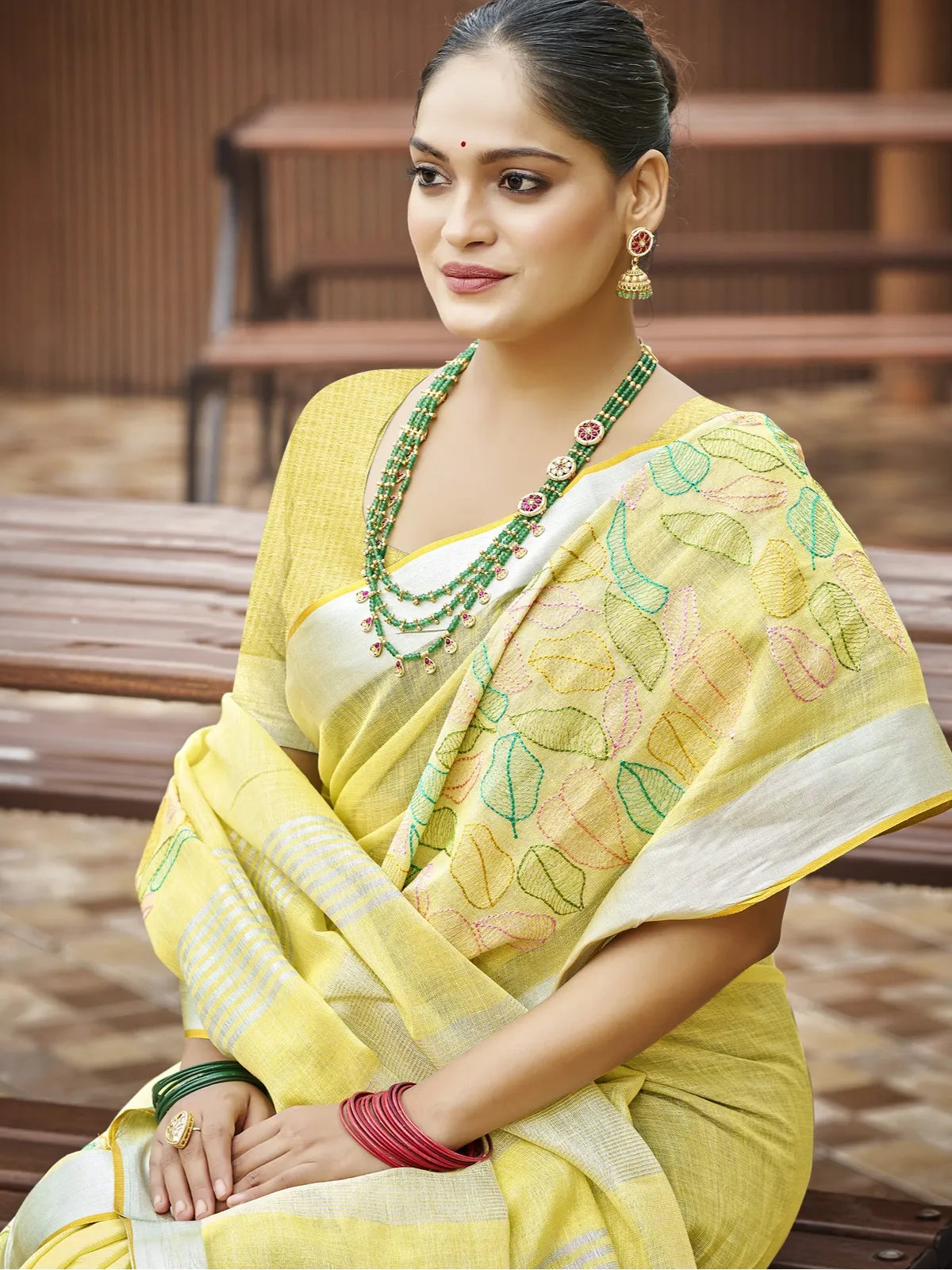 Tarani yellow linen saree front view elegant drape with blouse