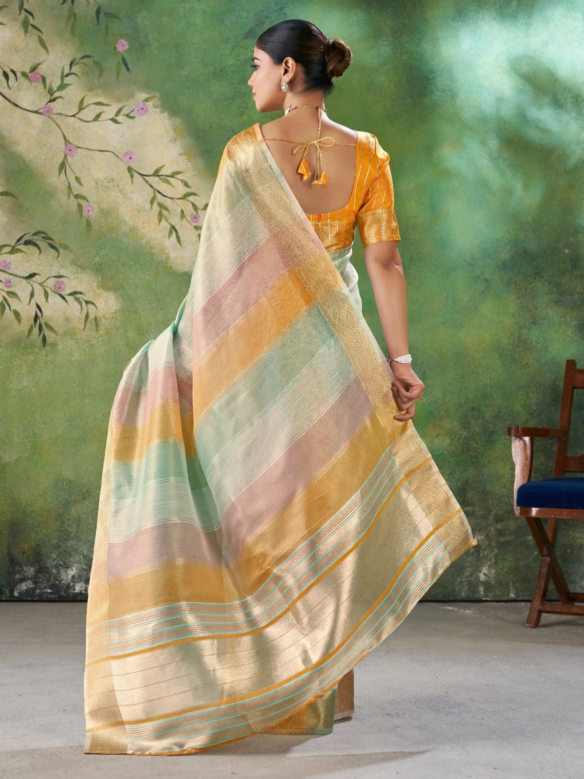 Tarani mustard linen cotton silk saree graceful back view