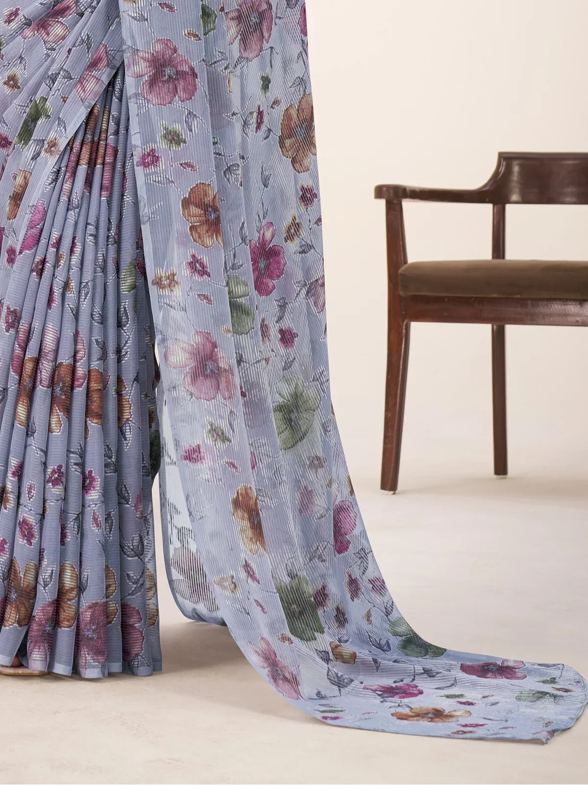 Tarani saree pallu view showing floral weave in soft blue Lurex Brasso fabric