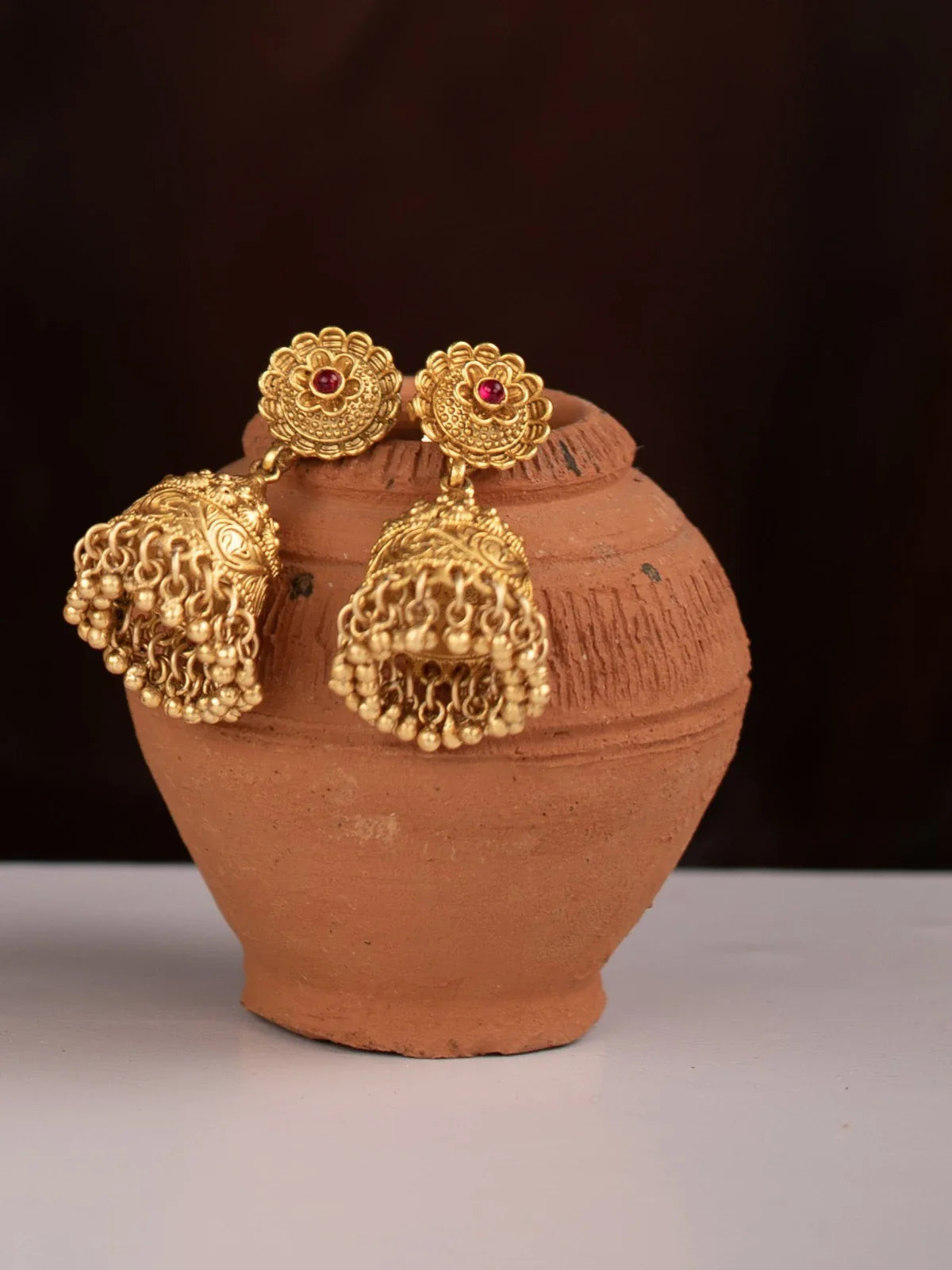 Tarani mangalsutra and jhumka earrings set view styled for festive and wedding occasions