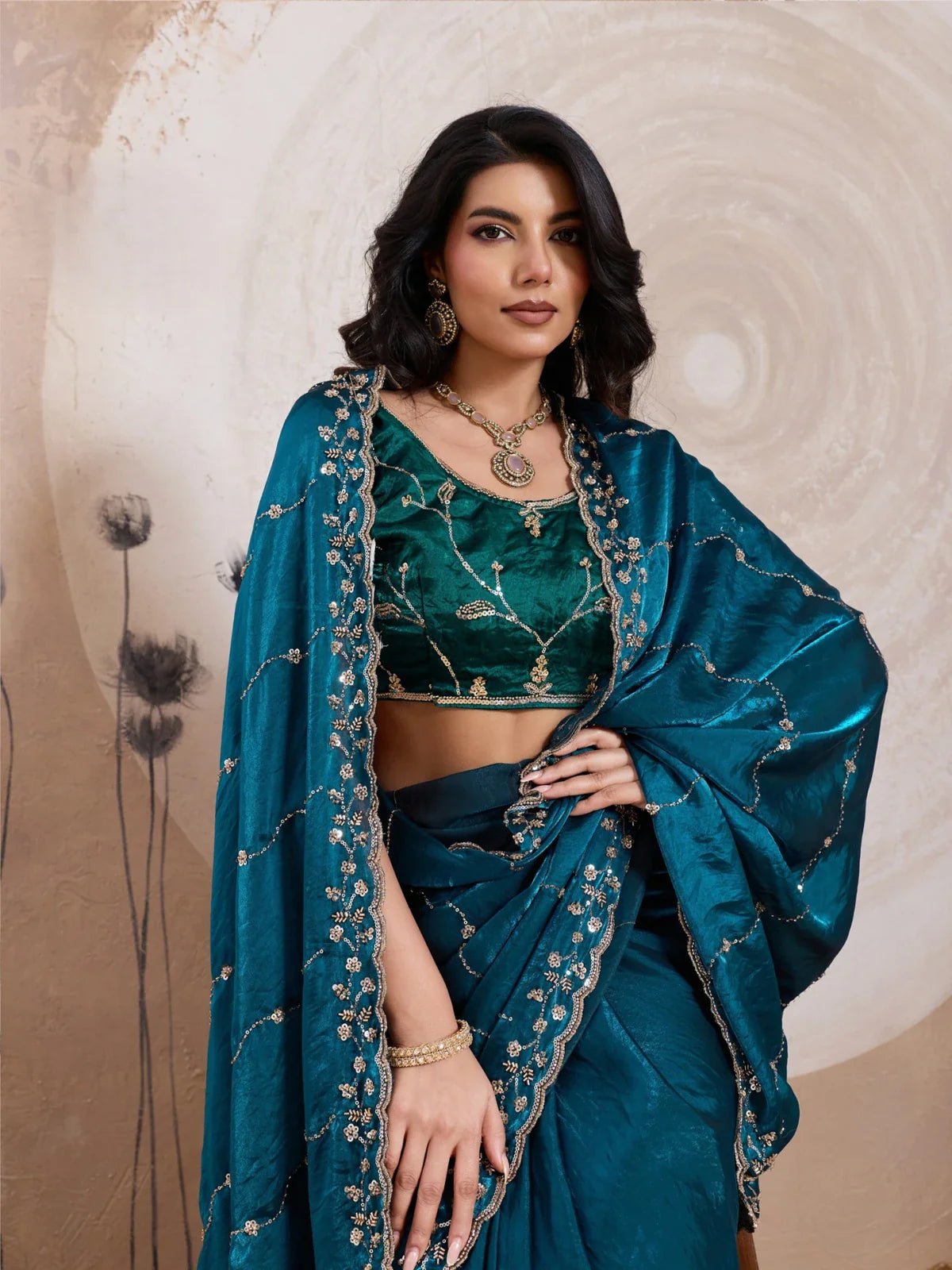 Tarani metallic velvet satin green saree with matching blouse in upper body pose