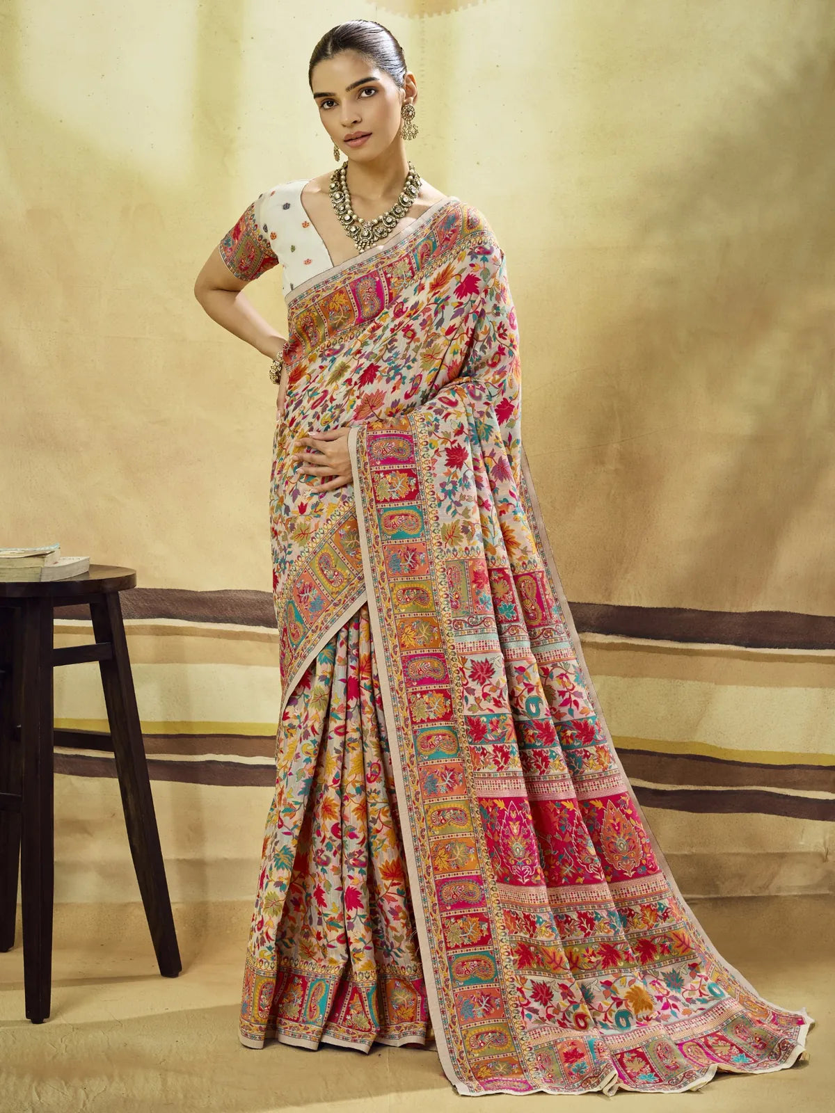 Tarani Harshika beige modal cotton pashmina saree full view with multicolor floral weaving