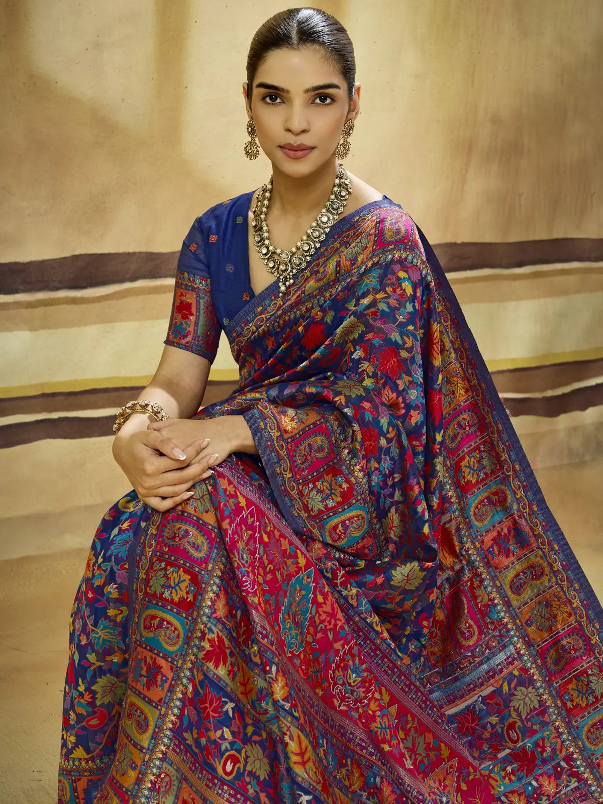 Tarani Sandhya navy blue Modal Cotton Pashmina saree front view with ornate multicolor woven detailing