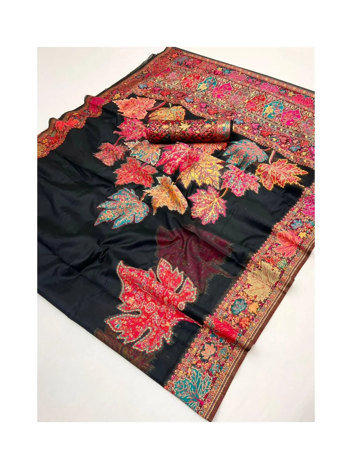 Tarani black saree pallu view with Kashmiri-style leaf patterns in vibrant multicolors