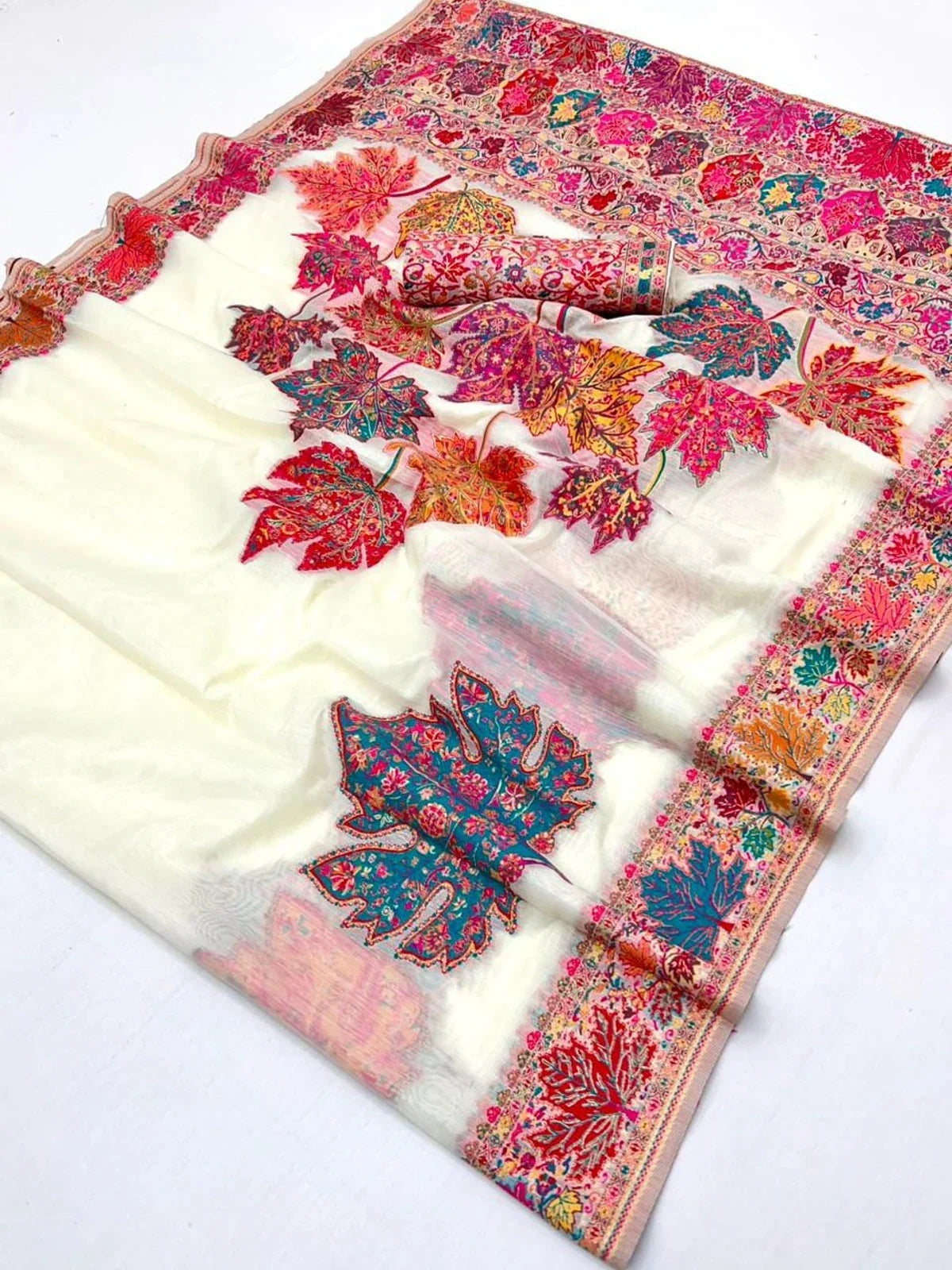 Tarani pallu view in multicolor embroidery on off white modal cotton fabric