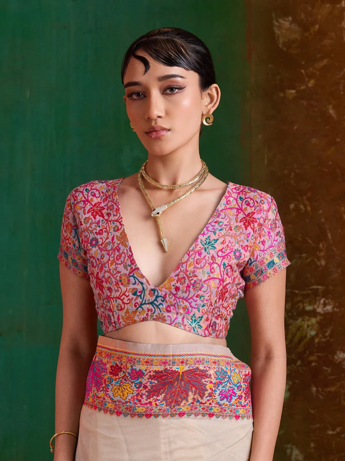 Tarani blouse close-up in pink with embroidered floral detail and neckline styling