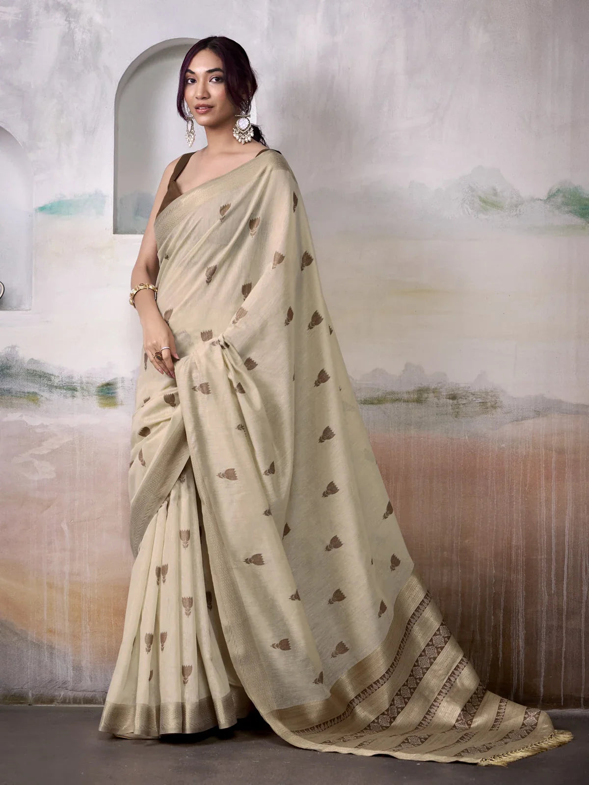 Tarani premium beige modal cotton saree with zari border and elegant drape full view